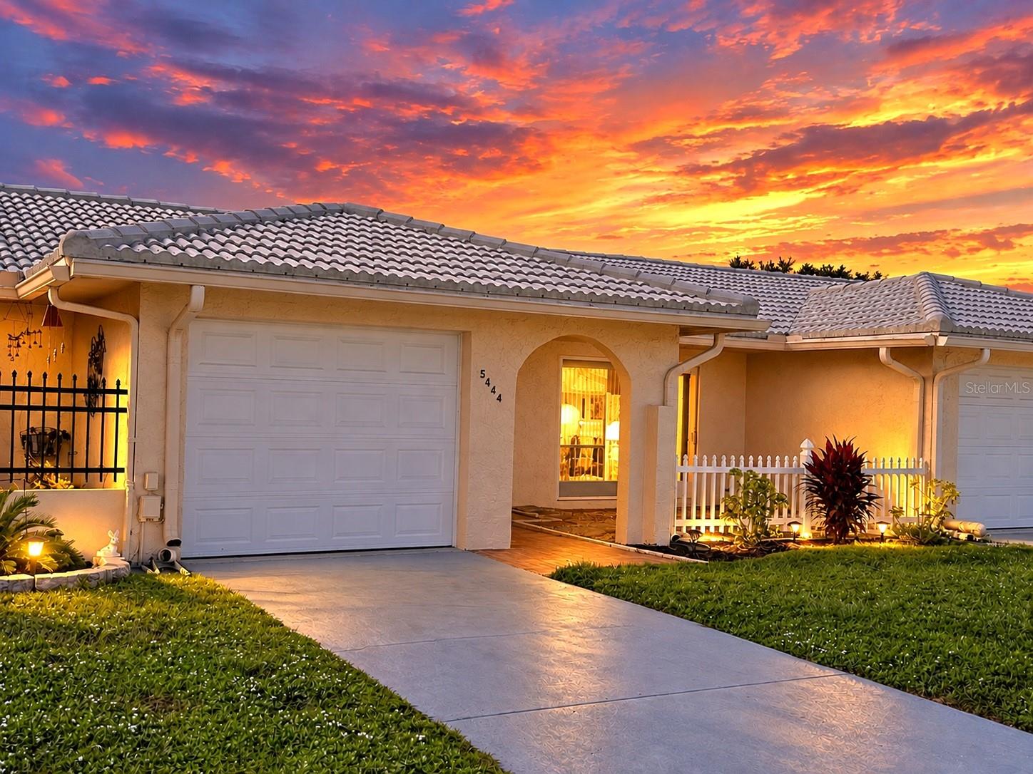 Virtually Staged. LOCATION, LOCATION, LOCATION! Check out this beautifully updated villa in the desirable Springwood II 55+ community! This inviting home on a quiet Cul-de-Sac offers an attached garage and a unique private atrium with direct access from both the bedrooms and living room, creating a wonderful private outdoor retreat. Step inside to a bright, open floor plan highlighted by high-impact sliding glass doors and an impressive, updated kitchen. The kitchen features gorgeous granite countertops, stylish backsplash, updated cabinetry with under cabinet lighting, a beautiful, coffered ceiling, stainless steel and black appliances, double sink, recessed lighting, and a huge breakfast counter—perfect for casual dining and entertaining. Additional updates include a newer HVAC system, newer water heater, newer flat roof, new sump pump, updated electrical panel, updated switches, digital thermostat, and select updated ceiling fans and LED light fixtures. The spacious primary suite features a walk-in closet, while the updated bathroom offers a stylish vanity, updated mirror and light fixture, and convenient walk-in shower. Inside Laundry. Enjoy the Florida lifestyle from your front patio, the perfect spot to relax and soak up the sunshine. With its open floor plan, private atrium, attached garage, numerous updates, and desirable Springwood II location, this villa has so much to offer.This active 55+ community has some great features including a sparkling community heated pool, updated clubhouse with gorgeous kitchen, patio overlooking a lake, gazebo with lake views, fitness center, library, game room, shuffleboard and more! Fee Includes: Cable TV, Community Pool, Escrow Reserves, Internet, Maintenance Exterior, Maintenance Grounds, Manager, Pool Maintenance, Private Road, Recreational Facilities, Sewer, Trash, Water. Conveniently located just minutes from Mainlands Golf Course, Bill Jackson’s Shop for Adventure, Aldi’s, Freedom Lake Park that offers Dog Park with large, fenced exercise space separated for large and small dogs, hydrants, watering holes, and plenty of shade for your pets, covered outside fitness stations, fishing, grilling, picnic tables, pavilions, brand new playground, walking track and the Korean War Memorial. Easy Access to Gulf Beaches, Sam’s Club, Coffee Shops, Fitness Centers, shopping, dining, Helen Howarth Park, Equestrian Trail, Dog Park and Forbes recreation area, I-275, St. Pete/Clearwater and Tampa International Airports. Come see all the features this beautiful home and community have to offer; it won't last long!
