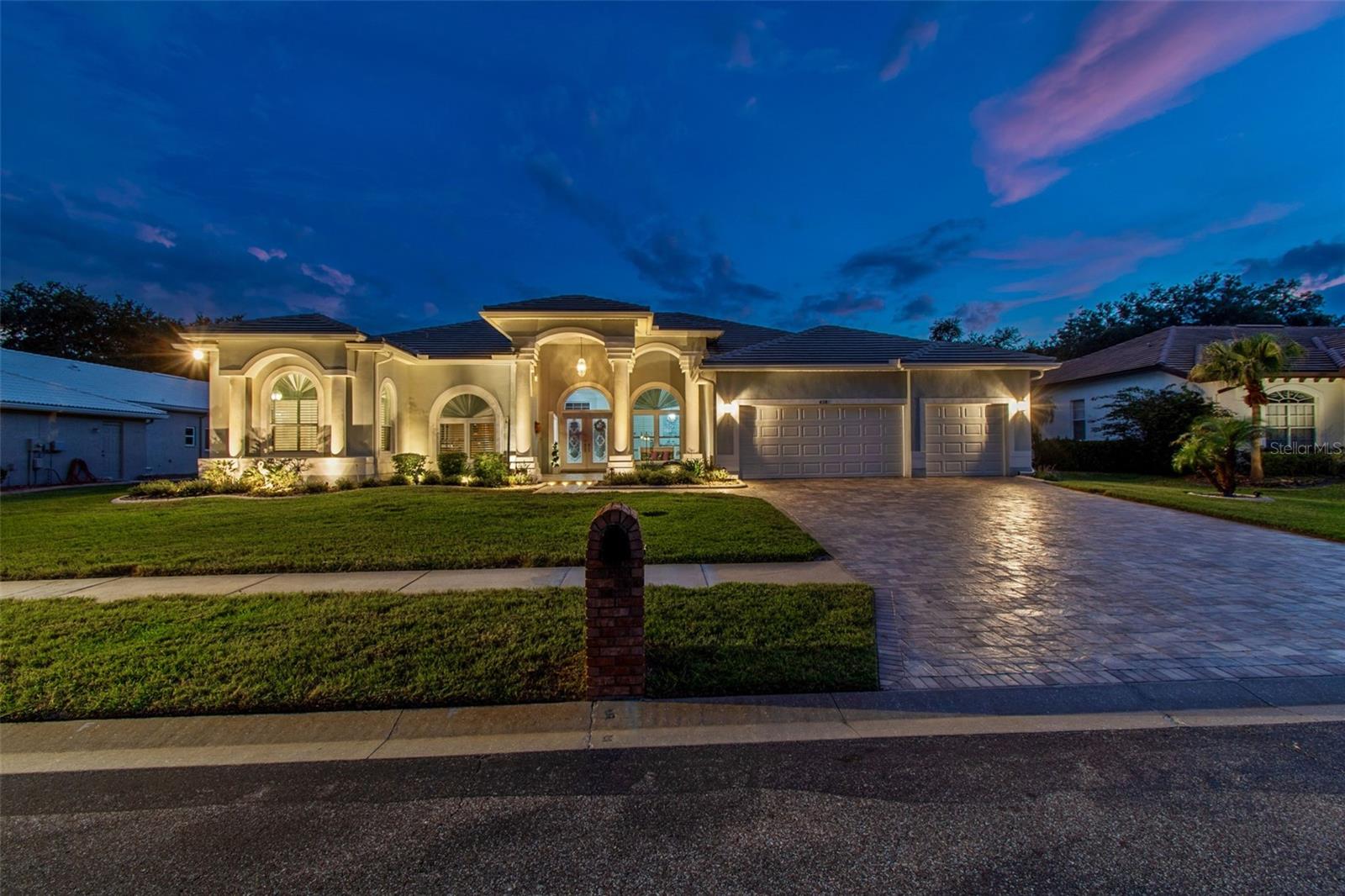 Welcome to this exceptional Rutenberg-built estate in the 24-hour guard-gated Crescent Oaks Country Club, offering stunning golf course views, low HOA fees, and the peace of mind of a non-flood zone location, along with the privacy of a second gated enclave. This beautifully maintained home features 4 bedrooms, 3 bathrooms, a dedicated office, and a 3-car garage. Inside, you’ll find soaring ceilings,abundant natural light, plantation shutters, crown molding, and an open, elegant layout. A spacious entertaining area with a custom wet bar overlooks the main living space, creating the perfect setting for gatherings. The updated kitchen with new appliances flows seamlessly into the living areas. The family room and primary suite each feature a cozy fireplace, while the primary retreat also offers a custom walk-in closet. Recent upgrades include windows and doors, tile roof, HVAC, water heater, garage doors, flooring, reverse osmosis and water softener system and more. Enjoy your backyard oasis with a resurfaced pool, spillover spa, marble deck, electric awning, and beautiful golf course views. A paver driveway, accent lighting, lush landscape and waterfall fountain adds to the curb appeal. Crescent Oaks residents enjoy a clubhouse, dining, tennis, pickleball, and a vibrant social scene—all conveniently located near shopping, dining, beaches, major airports and within A-rated school zones. Florida luxury living at its finest.