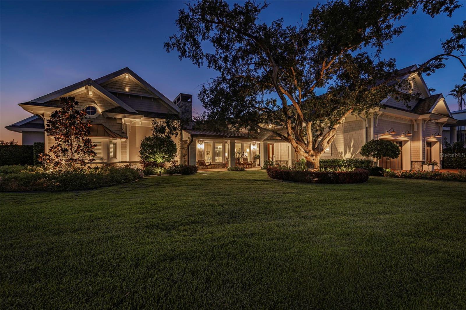 WATERFRONT ESTATE · DUNEDIN, FLORIDA Where Every Sunset Becomes a Private Performance...Estates with this particular alchemy of location, craftsmanship, and unobstructed sunset water views rarely come to market — and rarer still do they come with the amenities to enjoy them properly. This distinguished opportunity is for the discerning buyer who understands what true luxury is. Set directly upon the shimmering waters of St. Joseph Sound, this extraordinary waterfront estate offers a rare convergence of natural beauty and refined living. From the moment the sun begins its slow descent over the Sound, painting the sky in ribbons of amber and rose, it becomes clear that this is not simply a residence — it is a front-row seat to one of Florida’s most coveted views, held in trust for whoever is fortunate enough to call it home.Just minutes from the boutiques, waterfront cafés, and marina life of downtown Dunedin, this address offers the best of both worlds: the serenity of a private waterfront retreat and the vibrant charm of one of the Gulf Coast’s most beloved small towns, all within easy reach.Inside, the residence unfolds across gracious, natural light-filled living spaces where craftsmanship and comfort meet in equal measure. Multiple fireplaces anchor the home’s principal rooms, each one a study in warmth and quiet elegance — a refined stone hearth in the formal living room and another surrounded by brick as the centerpiece of the luxurious yet cozy dining area. Together, they lend the home a sense of timeless comfort. Walls of glass throughout the main living areas draw the eye — and the light — toward the water and beyond,  blurring the line between indoors and out and ensuring that the water views are never far from view, whatever the hour or occasion.LIFE ON THE WATER, ELEVATEDFor the boating enthusiast, this property delivers in kind. A recently upgraded boat lift stands ready at the private dock, offering effortless access to St. Joseph Sound and, beyond it, the open waters of the Gulf of Mexico.Whether the pursuit is sunset cruises, a morning of fishing, or simply keeping a vessel safe, dry, and ready at a moment’s notice, the infrastructure here has been thoughtfully appointed to match the caliber of the home it serves.Downtown Dunedin — with its acclaimed dining, art galleries, live music, and the Pinellas Trail winding along the water’s edge — lies just a short distance away, offering the rare  privilege of true waterfront tranquility without sacrificing proximity to culture and community. Honeymoon Island and Caladesi Island State Parks are close athand as well, rounding out a lifestyle defined equally by natural beauty and effortless convenience.PRIVATE SHOWINGS BY APPOINTMENT