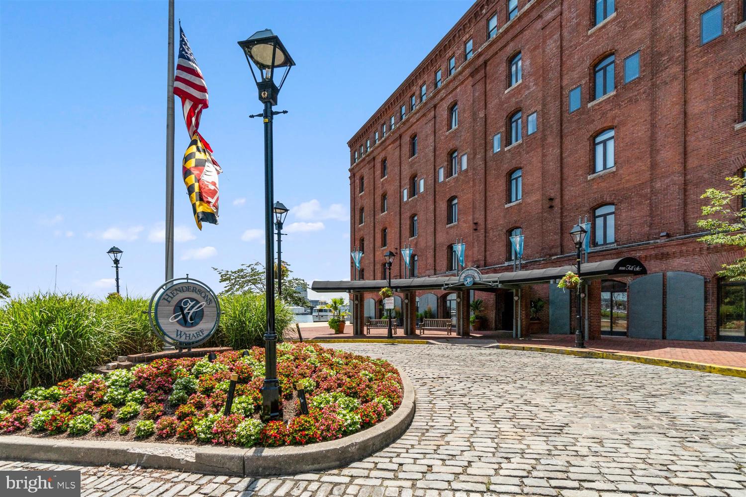 Rental Available 8/15/2026  Garage Parking Space INCLUDED IN MONTHLY RENT AMOUNT. Water also included.Please have your client read through the Henderson's Wharf Rules and Regs that are in the Document Section of this listing to get a better understanding of the Move In Fees and Process. $250 of the $500 Move In Fee is Refundable as long as no building damages are incurred. Pet restriction require pet be 35 LBS or less. Applications are processed through Canton Management (Property Manager) Use their website at https://www.cantonmanagement.com/   Go to Available Rentals, find the property and make application. Minimum 625 Credit Score Required.Condo is currently under lease. Tenants moving out on 8/3/2026.  Condo will be professionally deep cleaned, and any needed repairs completed for a 8/15/2026 move in date.  Come take a closer look at this great find in one of Baltimore's premiere condo buildings.  There is a separate residents entrance that maintains two elevators.  Right in the heart of Fells Point just steps for all of the great restaurants and nightlife.  Use the promenade to walk to Canton along the water or make it your new exercise location.  The condo rental also allows for you to use the fitness center located in the main lobby of he building.   Hederson's Wharf maintains a secure package room for all of your delieveries.Take a look at this great open floor plan condo. 803 Suqre Feet.  Peaceful and quiet courtyard view from both the living room and bedroom. Quality engineered wood flooring throughout. Tiled Bath/Shower, SS appliances, Stacked Washer and Dryer in the condo, bedroom walk in closet, neutral grey paint throughout, Lock Box located in Tenant Entrance lobby.  Large wooden cabitnet houses a central lock box for all units in the building.  Insturctions for use will be provided by Showing Time.Secure building. 24 hour Concierge and and 24 hour canera surveillence. Henderson's Wharf is located directly on the water at the end of Fell Street directly accross from The Crescent.