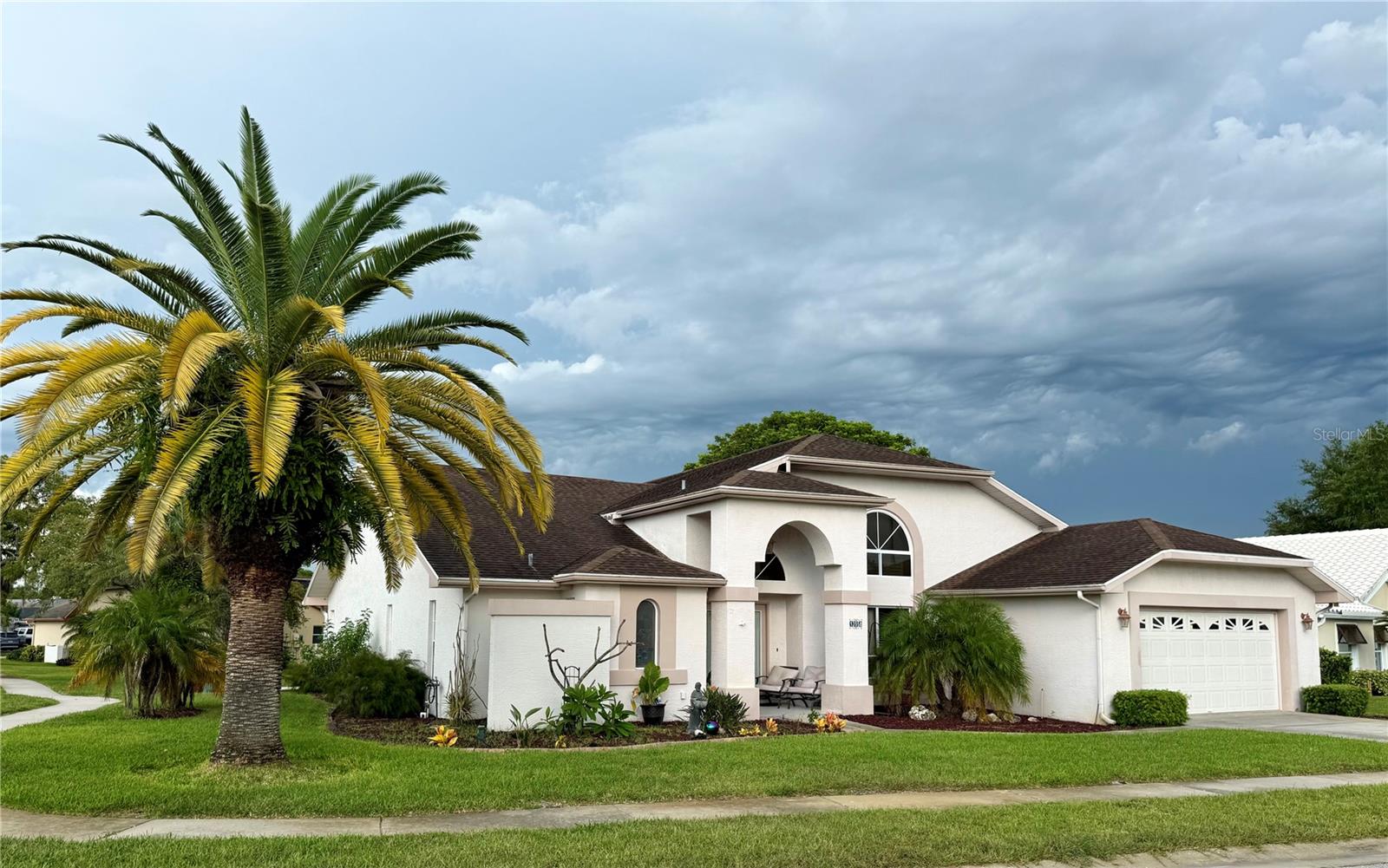 Opportunity awaits in this spacious 3-bedroom, 2-bath home offering 2315 square feet on a desirable corner lot in Hudson, Florida. Originally the model home, this residence boasts impressive 17 foot ceilings and a large screened in pool. Recent updates include a new A/C in 2025(Air Handler 2026), pool heater in 2025, roof 2012, and newer stainless steel kitchen appliances. Located in a non-flood zone, this home needs only cosmetic updates, making it an ideal opportunity for buyers to add their personal style. Priced to reflect the cosmetic improvements needed and for a quick sale. Being sold as is for the seller’s convenience. Don’t miss the chance to own a spacious home with outstanding potential in a desirable Hudson location close to US 19, hospital, and shopping...