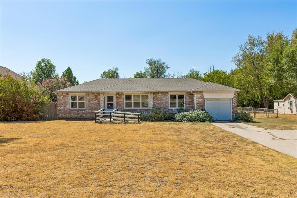 Are you looking for a large lot in town?  This is it! Over 1/2 Acre Lot on Reno! Whether you are looking for a new home or an investment, this is a perfect property.  Currently zoned residential but has the potential to be commercial now or in the near future. Fresh interior Paint, New Flooring, Roof replaced in 2025!  2 Bedroom with possible 3rd bedroom that does not have a closet but it does have clothes racks.  Carl Albert Schools • Wheelchair Ramp at Front Porch •
