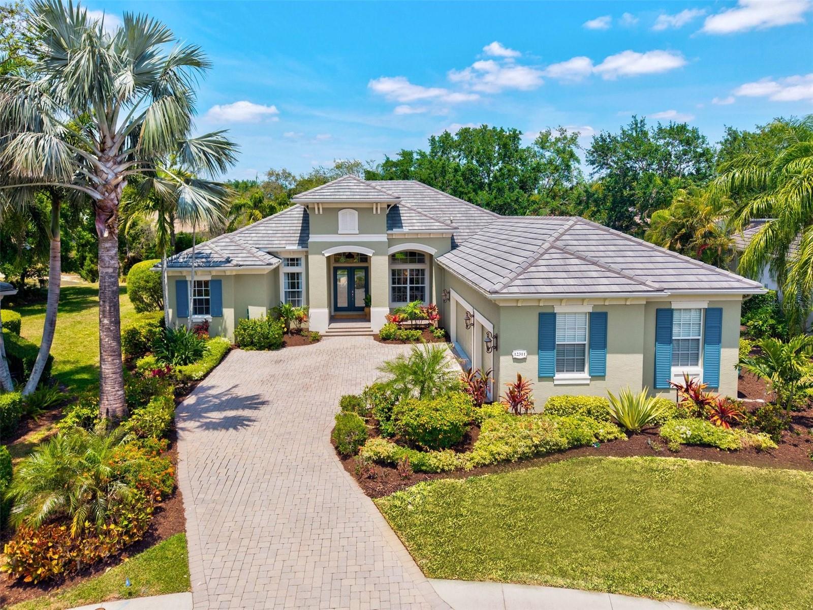 Completed in February 2025, this residence is truly one of a kind. Welcome to 12311 Newcastle Place, located in the exclusive Greystone section of Lakewood Ranch Golf and Country Club, where modern luxury meets timeless craftsmanship.
This isn't just a renovation—it’s a complete transformation. Taken down to the studs and meticulously rebuilt with today’s discerning homeowner in mind, this home now showcases a top-to-bottom reimagining that blends functionality with flawless design. Walls were removed to create an open, airy layout that flows seamlessly from room to room, drenched in natural light and elevated by high-end, designer finishes throughout.
The gourmet kitchen is a true showstopper, featuring custom cabinetry, high-end appliances, and gleaming quartz countertops that extend across a generous center island—perfect for hosting unforgettable gatherings. Details like Serena & Lily light fixtures add coastal elegance, while premium plumbing brands such as Pfister, Hansgrohe, and Toto provide a refined touch in both kitchen and baths.
Love entertaining? The built-in bar is already stocked and ready—with a kegerator waiting for your favorite brew on tap!
The primary suite feels like a boutique hotel retreat, offering a spa-inspired bathroom with a Aquatica freestanding soaking tub, beautifully tiled walk-in shower, dual vanities, and his-and-hers walk-in closets. Throughout the home, you’ll find wide-plank flooring, sleek architectural elements, and a calming color palette that embodies modern luxury.
Even the guest bathrooms have been fully curated for comfort and style—no detail overlooked. For added peace of mind, major systems like the HVAC units (2021) and water heater (2020) are newer, offering efficiency and reliability.
Situated on a spacious cul-de-sac lot, this move-in-ready masterpiece is more than a home—it's a lifestyle. And for those with an eye for design, select furnishings are available under separate contract.
Why wait through construction chaos when you can have it all—right now?