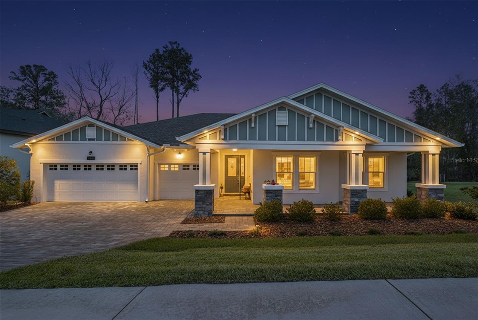 Welcome to the highly sought after golf course community of Southern Hills! This 4 year old one story Craftsman style build sits on a huge 0.4 acre lot and is loaded with upgrades. The CDD bond has been paid off on this home! You are greeted upon driving up to a fully pavered driveway and front porch, and a large 3 car garage. Natural light is abundant in this home from the minute you step through the front door. High ceilings make this home feel spacious and airy. This completely open floorplan has the living room, kitchen, and dining room all tied cohesively in the center of the home - perfect for entertaining! This elegant kitchen includes Quartz countertops, stainless steel appliances, a built-in oven, an oversized island with plenty of seating, and a built-in pantry. The primary suite includes a large en suite bathroom featuring a seamless entry shower, double vanities, a soaking tub, and 2 huge walk-in closets. All of the bedrooms and bathrooms are on completely different corners of the house for ultimate privacy. This beautiful build includes 2 outdoor covered patios, one of which is screened with stackable sliding glass doors, and pre-plumbed for an outdoor kitchen! This oversized fully fenced backyard offers privacy and plenty of space to expand the patios or add a pool! Additional upgrades in this home include: plantation shutters, tankless water heater, irrigation in both the front and back yards, tray ceilings in the living room and primary bedroom, in-wall pest control system, and gutters all the way around with a leaf prevention screen. The spacious 3 car garage is perfect for multiple cars and a golf cart, and features additional storage inside as well. Not only is Southern Hills home to one of the most prestigious golf courses in Florida, it also features some incredible amenities including a resort style pool, Har-Tru tennis courts, pickleball 2 restaurants, multiple bars including a pool bar, a driving range, gym, a 24/7 security gate, and more! Easy access to the Veterans Expressway, I-75, Major hospitals, and just 45 minutes to Tampa International Airport.