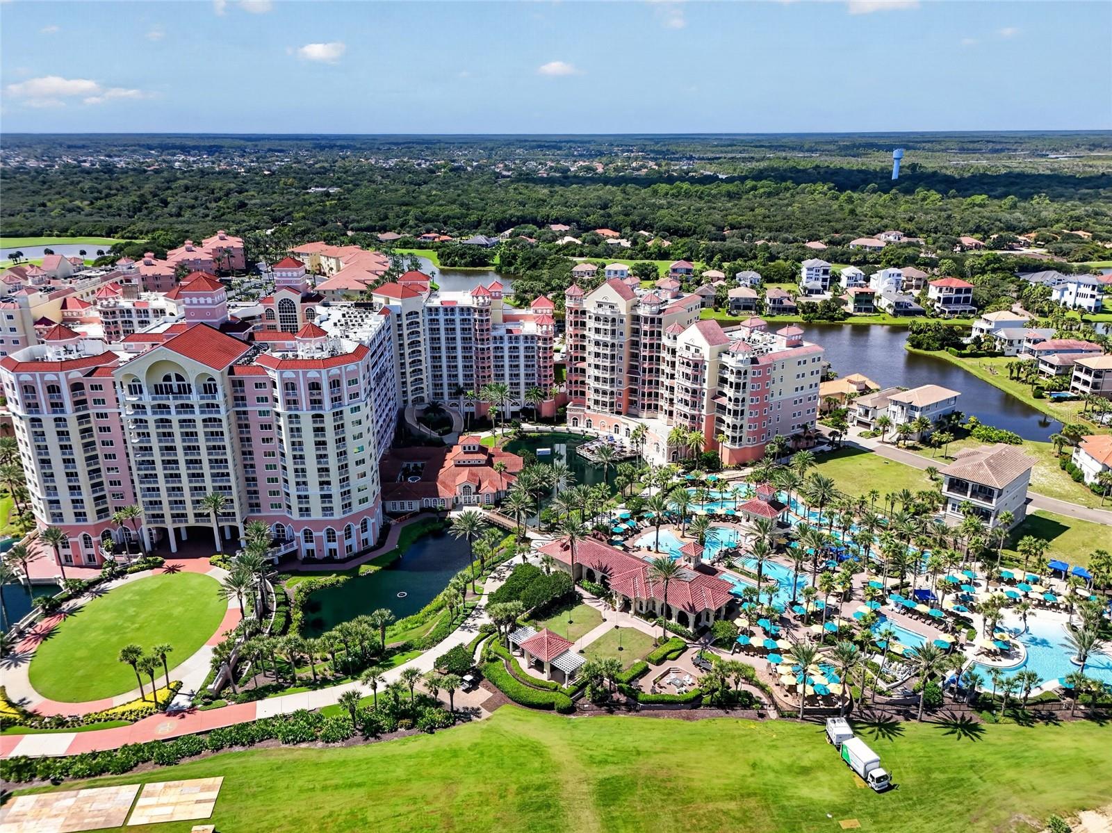 Welcome to an exceptional opportunity in the highly sought after North Ocean Tower at Hammock Beach. This beautifully decorated 4th-floor corner residence offers an impressive combination of space, privacy, ocean views, and resort-style living in one of Palm Coast’s premier coastal communities.Spanning 2,588 square feet, Residence 451 features 3 spacious bedrooms, 3.5 bathrooms, a private elevator entrance, high tray ceilings, crown molding throughout, and beautiful travertine tile flooring. The open-concept living and dining areas are filled with natural light and flow effortlessly to the expansive balcony through floor-to-ceiling sliding glass doors, creating the perfect setting to relax to the sounds of the ocean and take in the surrounding ocean front views.The gourmet kitchen is designed for both entertaining and everyday living with granite countertops, high-end wood cabinetry, stainless steel appliances, and a Sub-Zero wine cooler. The spacious primary suite offers a private retreat with an ensuite bath featuring a Jacuzzi tub, oversized walk-in shower, dual sinks, and generous space to unwind.Designer furnishings are included, making this residence an incredible opportunity to step right into the Hammock Beach lifestyle.Beyond the residence, enjoy beautiful **oceanfront views overlooking the impressive Hammock Beach Resort amenities**, creating a true resort-style backdrop from your own private retreat. Hammock Beach Club membership is available separately, offering access to two signature golf courses, a state-of-the-art fitness center, an expansive pool pavilion, full-service spa, tennis, dining, and additional resort amenities.Whether you're searching for a primary residence, an elegant second home, or your own coastal retreat, Residence 451 delivers the space and comfort of a private home with the ease of luxury condominium living—all just steps from the Atlantic Ocean.**Come experience the views, the space, and the lifestyle that make Ocean Towers at Hammock Beach truly exceptional.**