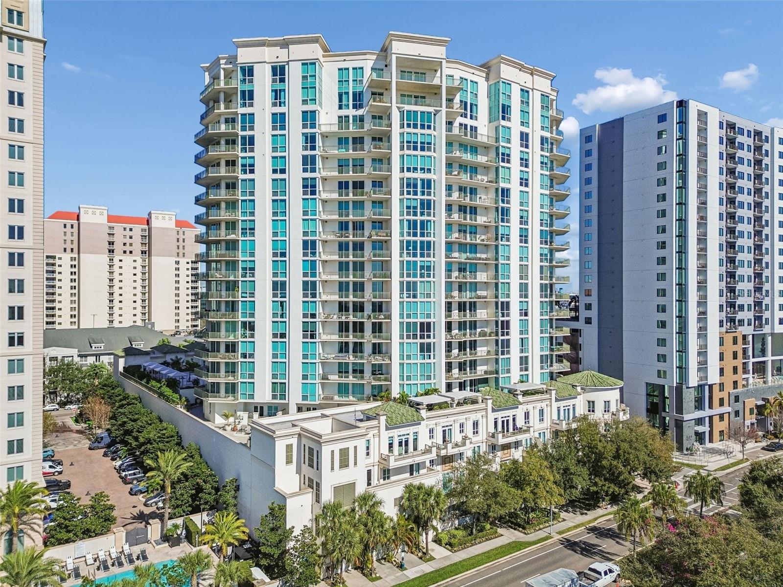 One or more photo(s) has been virtually staged. Designed for those who value convenience, location, and elevated amenities, this full service condo on Harbour Island offers an effortless, lock and leave lifestyle just minutes from downtown Tampa. Concierge services and valet parking simplify daily living, while a full suite of amenities supports a comfortable, low maintenance way of life in one of Tampa’s most desirable neighborhoods.Inside the residence, floor to ceiling balcony doors fill the space with natural light. The open concept layout allows the kitchen, dining, and living areas to flow seamlessly together, making the space functional for everyday living and easy entertaining. The kitchen features stainless steel appliances, while a washer and dryer inside the unit adds everyday convenience.The primary suite offers a comfortable retreat with direct balcony access and a spa inspired bathroom featuring a double sink vanity and thoughtfully selected finishes. A second bedroom and additional baths provide flexibility for guests, a home office, or additional living space, making this condo well suited for a variety of lifestyles.Residents enjoy resort style amenities including a pool and hot tub, outdoor grilling and entertaining areas, a resident lounge and meeting room, a fully equipped fitness center, and a spa and sauna that support an active, wellness focused routine. The Harbor Island location places you within walking distance of Benchmark Arena for concerts and hockey games, as well as dining and everything downtown Tampa has to offer, while still providing a quiet retreat at home.This location is within a highly regarded school district.Recent updates include a new HVAC system and hot water heater, both replaced in 2024, offering added peace of mind and long term value.Schedule your private tour today and experience the ease of full service living on Harbor Island.