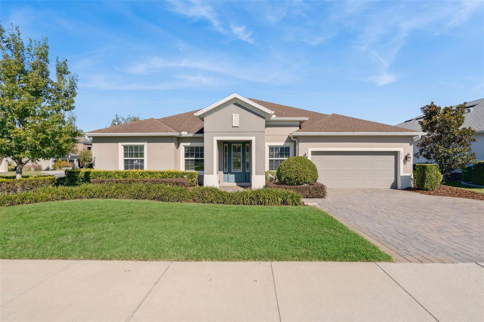 Under contract-accepting backup offers. Welcome to this beautifully designed 5-bedroom, 3.5-bath home with an office/den located in a desirable gated community in Oviedo, just minutes from SR 417—perfect for commuters! Built in 2018, this residence offers modern style, thoughtful upgrades, and a spacious, functional layout. Step through the front door into a long foyer that opens to the great room, creating a bright and inviting living space. A formal dining room sits at the front of the home and connects to the gourmet kitchen through a convenient butler’s pantry. The kitchen is a true centerpiece, featuring stone countertops, a large island with breakfast bar, stainless steel appliances, a built-in oven, stainless range hood, updated lighting, a spacious pantry, and a cozy dinette. The office/den with elegant French doors is ideally located at the front of the home—perfect for working from home or as a quiet study. Enjoy the ease of a triple split floorplan, offering privacy and flexibility for family and guests. The extended primary suite is a true retreat, situated at the back left of the home and expanded by 4 feet for extra space. The en-suite bathroom features dual vanities, a garden tub, a large tiled shower, and walk-in closet with a custom closet system. Two bedrooms share a full bath with separate vanities in each bedroom and shared wet area with shower/tub combo. An additional half bath is conveniently located off the front hallway, adjacent to these rooms. Two more bedrooms and a full bath with a tiled shower and frameless glass enclosure occupy the back right of the home. Tile flooring runs throughout the main living areas, with plush carpet in the bedrooms for comfort. The interior laundry room provides access to the 3-car tandem garage, ideal for storing a boat or extra-long vehicle. Enjoy seamless indoor-outdoor living with triple retracting sliding doors in the great room that open to a covered and screened patio—perfect for entertaining. The paver patio extension, fenced backyard, and firepit area make the outdoor space as inviting as the interior. This corner-lot home is located in a welcoming community that offers a playground and convenient access to local schools, shopping, and dining. Don’t miss the opportunity to make this exceptional property your new home in Oviedo!