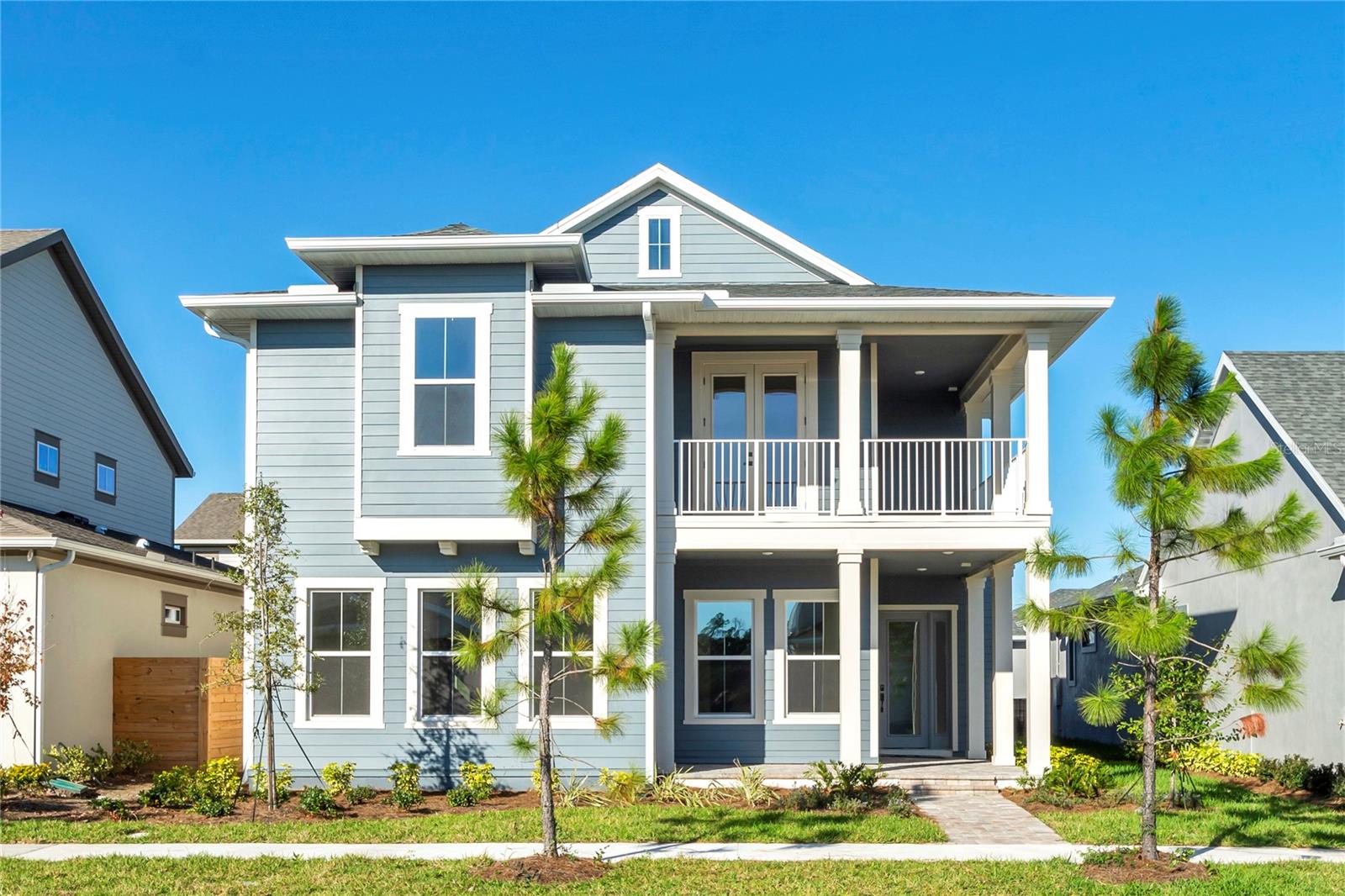 Move-In Ready! The Fiji: A Masterclass in Modern Luxury and Effortless Living. Welcome to The Fiji by ICI Homes, a Florida-based, family-owned builder renowned for exceptional quality, thoughtful craftsmanship, and homes designed for the way people truly live. This move-in-ready residence means no waiting, just the opportunity to step straight into a lifestyle where every day feels like a private getaway. Offering 3,100 square feet of beautifully designed living space, The Fiji artfully blends sophistication, flexibility, and warmth created for those who love to entertain as much as they love to unwind. With four bedrooms, three-and-a-half baths, and spaces that flow with purpose, The Fiji transforms daily life into something extraordinary. Step through the grand foyer into a light-filled living area that opens seamlessly to the outdoors. Expansive sliding glass doors invite the breeze in and extend your living space to a covered lanai, ideal for alfresco dining, morning coffee, or sunset gatherings under the Florida sky. At the center of it all, the gourmet kitchen shines as both a showpiece and a chef’s dream, featuring premium appliances, a walk-in pantry, and a statement kitchen island perfect for serving, socializing, or sipping wine while dinner simmers. The adjoining dining area creates an inviting setting for casual family meals or elegant evenings with friends. The first-floor primary suite is a sanctuary of calm that is tucked away for privacy and styled for indulgence. Dual walk-in closets and a spa-inspired bath with dual vanities, a soaking tub, and a glass-enclosed shower turn everyday routines into restorative rituals. Nearby, a versatile flex room adapts effortlessly to your needs as a home office, study, or reading lounge. Upstairs, family and friends will love three spacious bedrooms and a generous game room made for movie nights, laughter, and lazy weekends. Designed with comfort and efficiency in mind, The Fiji includes high-performance Low-E windows and a hybrid hot water heater, enhancing year-round comfort while helping reduce energy costs. Finished with a striking coastal elevation and backed by ICI Homes’ commitment to quality and customization, this home offers the confidence of working with a trusted Florida builder who has been family-owned for decades. The Fiji isn’t just a home. It’s where design, comfort, and connection come together to create a life that feels like luxury every single day.