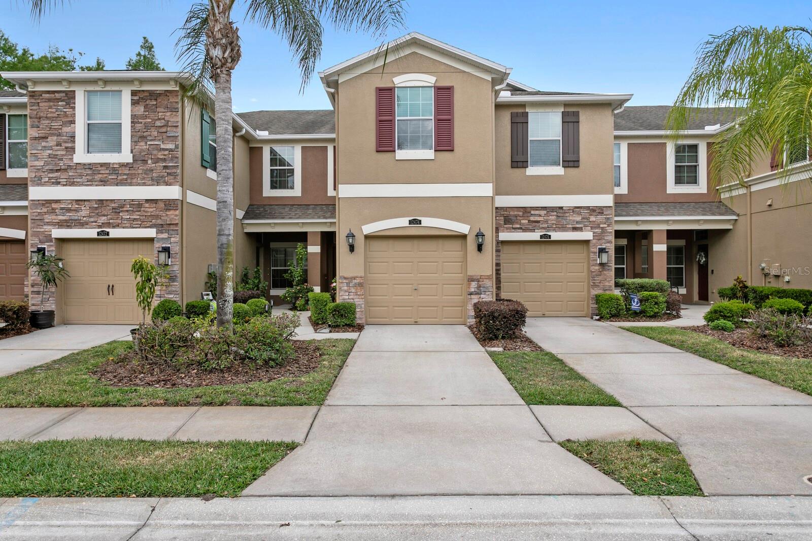 Welcome to 12474 Streamdale Dr, a meticulously cared for, well-upgraded town home in the gated, desirable South Hampton community. This 2 bedroom plus loft, 2 and a half bathroom townhome offers an open concept living space, with the well-appointed kitchen (granite counter tops, newly painted cupboards, stainless steel appliances!) overlooking the large living room/dining room combo, all with luxury vinyl flooring. Upstairs find the 2 split bedrooms separated by a large bonus space, perfect for a home office or separate living area. The 15x14 ft primary bedroom offers his and hers closets and private bath, complete with double vanity and glass shower. Nice sized 2nd bedroom comes with a murphy bed, perfect for dual use bedroom/office. Recent upgrades: Security System, Kitchen cabinets painted (2025), New Carpet (2025) Upstairs painted (2023), Range and Microwave (2023) Ceiling Fans (2022) Refrigerator (2022) AC (2021) Luxury Vinyl Flooring downstairs (2019) Crown Molding (2016) Overhead Storage Rack in garage. This home is the definition of move-in ready, schedule your appointment today.