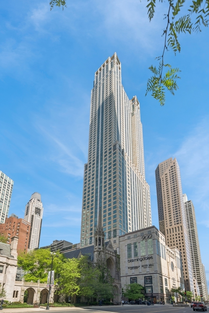 Enjoy the best of luxury living in this sleek, sophisticated southwest corner unit at the Four Seasons Chicago. Unit 5101 was fully rehabbed in 2019 and offers 3 bedrooms, 3 bathrooms spanning 2,500 square feet of beautifully renovated space. High-end finishes throughout include wide-plank oak hand scraped hardwood floors throughout, and window sills made of quartz with custom sewn cushions for added seating. The elegant foyer opens up the expansive living space with city views filling the living room, family room and dining room. The living room has a high-end Bang & Olufsen retractable television with Beolink 5.1 surround sound system. The kitchen was designed with custom cabinetry, quartzite countertops, an island with both seating and storage, and high-end Wolf and SubZero appliances, all new during the renovation. The kitchen island seats 4 people, perfect for in-kitchen dining and watching the sunset. Off the kitchen, find the dry-bar, custom cabinetry with a beverage / wine refrigerator. You will fall in love with the primary suite's two oversized closets, and grand bathroom with custom designed double vanities, a spa-like shower, and soaking tub. The second bedroom is complete with two closets and an en-suite bathroom. The third bedroom was built-out to an office with custom stained walnut cabinetry. The stunning built-in features a dual workstation and plenty of storage. This room is complete with a closet and adjacent to the third full bathroom. The third bathroom has simple elegance with natural looking linen tile. Additional highlights include a large laundry room, spacious storage closet, and Control 4 smart home system throughout controlling all lights, audio, video, and Holly Hunt shades. Residents enjoy access (via membership) to the newly renovated amenities of the Four Seasons Hotel: 24-hour room service, a world-class spa, pristine indoor pool, and state-of-the-art fitness center, room service and more. With round-the-clock staff and concierge-level service, this full-service building delivers an unmatched lifestyle of luxury and convenience. Parking is leased through Metropolis. Storage locker 82 included.