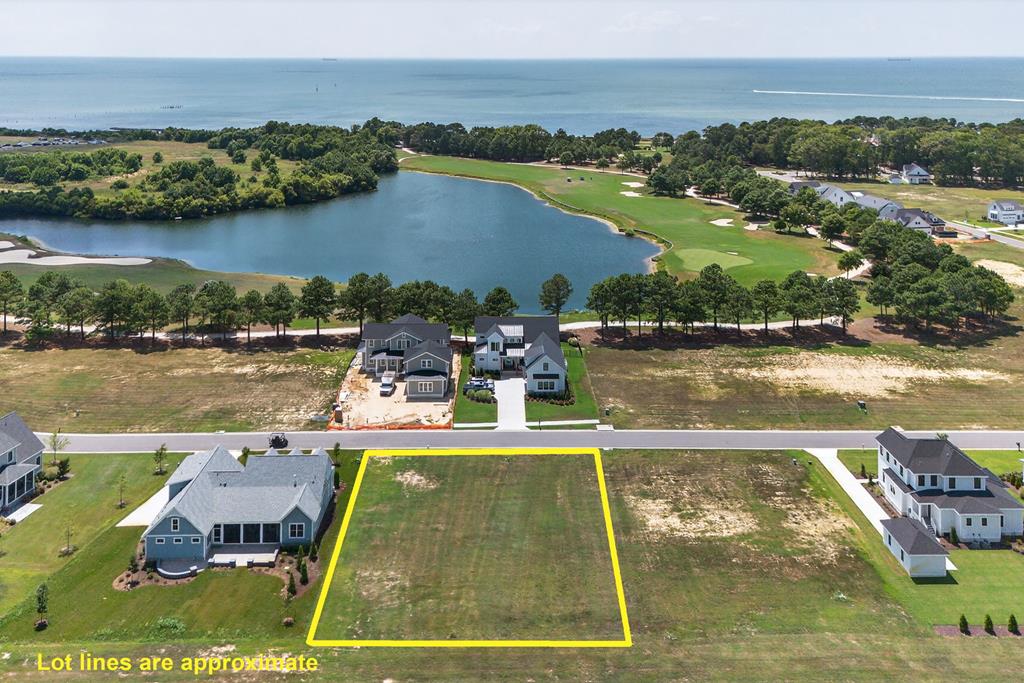 Don't miss this opportunity to secure Homesite 94 in Muirfield—an exceptional setting for your custom luxury home in the prestigious Bay Creek community. With limited homesites remaining, now is the time to build your vision and embrace refined coastal living. Bay Creek offers an unmatched lifestyle with private beach access, championship golf, pool, tennis, pickleball, and the LifeCenter with fitness and curated activities. Surrounded by natural beauty and just minutes from historic Cape Charles, this is where elegance meets tranquility. Act now and claim your place in one of the Eastern Shore's most sought-after coastal communities. Builders Guild Available to streamline the building process!