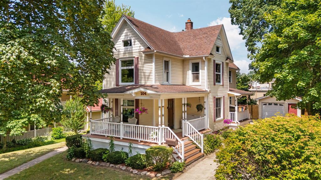 Step inside this beautifully updated, turn-of-the-century Queen Anne home just steps from downtown Saline! Featuring 3 bedrooms, 3 bathrooms, plus a private in-law suite, 1 car detached garage, & private fenced yard. This residence boasts a chef's kitchen with Birch cabinets, SS appliances, quartz counters, and Maple flooring. Additionally, a first floor office/den, living room, and dining area. Enjoy a spacious primary suite, remodeled baths, and recent upgrades like a Generac generator, tankless water heater, wood floors, and professional landscaping. Relax on the wraparound porch or two-tiered deck overlooking a private backyard. Walk to parks, shops, and restaurants!