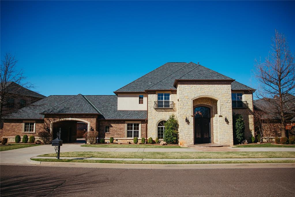 Welcome home to Rivendell on the water! This incredible property is located in one of south Oklahoma City's highly sought after neighborhoods. Built in 2008, this 6,840 square foot home sitting on 0.47 acre lot, has so much to offer. Two story home with 4 bedrooms, 4 full baths, 3 half baths, two separate living areas on the first floor, two dining areas, study, and beautiful prayer room. Upstairs with home theater room, game room with wet bar for all of your college football parties, and exercise room. Two separate two car garages, for ease and convenience. Back patio dream with outdoor kitchen, stunning pool and hot tub, outdoor gas fire pit, all overlooking the water. Doesn't get much better than this! Relax in your primary suite after a long day. Sizable his and hers walk-in closets, double vanities, a great deal of storage, gorgeous tub and separate shower like you're visiting a day spa. Prominent study and prayer room on the same side of home as primary suite on the first floor. Upon entry, you're greeted with the formal dining area, and just beyond that your expansive formal living area with floor to ceiling windows overlooking the back patio, pool and water feature. This view will never get old; like you're on holiday every single day. Amazing gourmet kitchen with oversized island, butler's pantry, immense amount of counter space for entertaining, stunning woodwork throughout, commercial style oven and range for the chef. Kitchen and informal dining area opens up to the back living area with gas fireplace, also overlooking the pool and lake. Roof recently replaced in 2025. Schedule your private tour in Rivendell today!