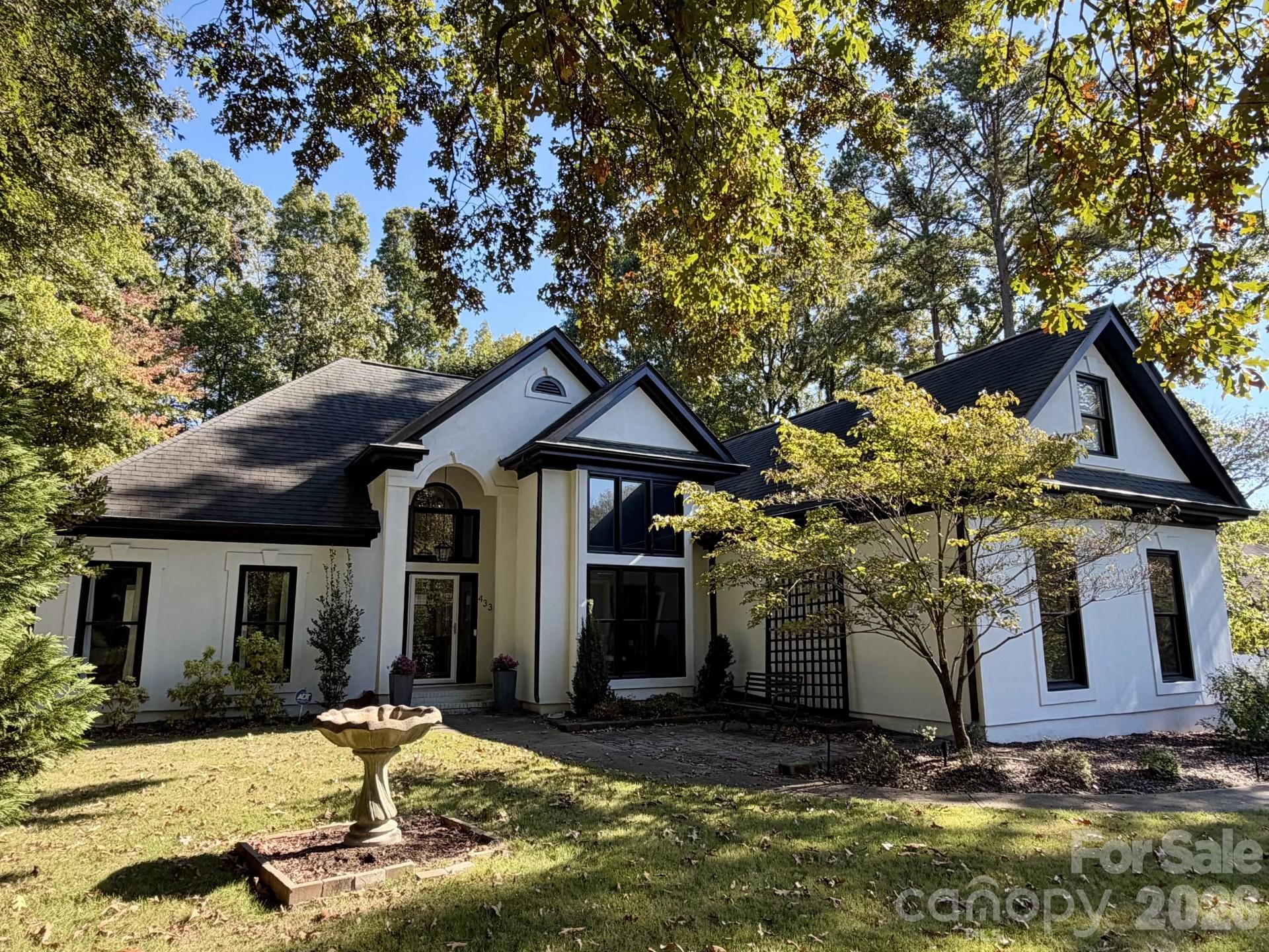 Welcome to this luxurious single-story home reimagined by the interior designer herself. With more than $125,000 in upgrades, 488 Wilby Drive offers refined living on a nearly half-acre flat lot in one of Charlotte’s most coveted locations.The redesigned kitchen showcases custom cabinetry, quartz countertops, a gas range with a dedicated vent hood, and smart appliances. The fully renovated primary bath is sleek and features heated floors - the luxury you didn’t know you needed. At the heart of this three-bedroom, two-bath home, the vaulted living room offers an inviting gathering space. New pre-engineered hardwood floors run throughout the home, complemented by custom wallpaper, and fresh interior and exterior paint.This rare gem offers seamless indoor-outdoor living. The overly spacious deck features a gas fire table, while the custom patio offers an additional built-in gas fire table, overhead string lights, and thoughtfully designed landscaping. Lush turf and a storage shed complete this charming private outdoor setting. Enjoy close proximity to SouthPark, Matthews, and major highways.