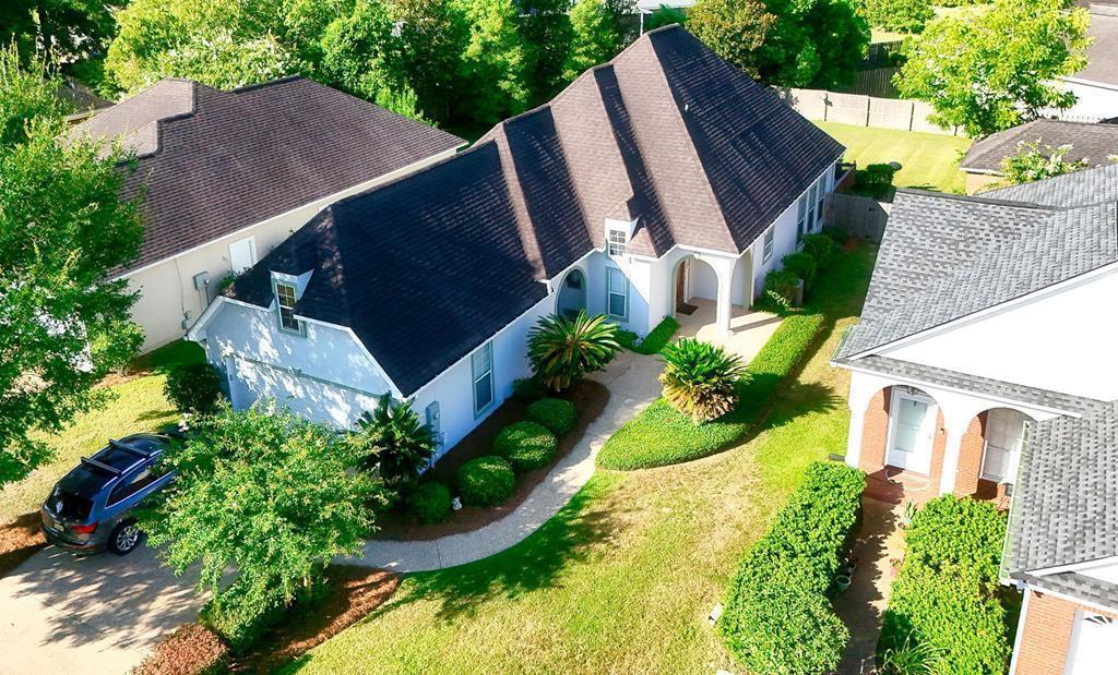 Looking for easy maintenance living near downtown Thomasville, GA with space, privacy, and an easy walk for exercise? If you are searching for maintenance-free living near downtown Thomasville, this home checks the boxes. Located in a popular sub-division that offers a greenspace for pets or kids and easy to walk for exercise, this home feels quiet and friendly while still close to everything you need. Inside, you'll find an updated kitchen with new appliances and plenty of cabinet space. The open layout leads to a huge owner's suite with a large bedroom and bathroom, plus a separate shower and soaking tub. Step outside to a private backyard that is fully fenced with a privacy fence—perfect for relaxing or letting pets play. This home includes a 2-car garage, newer hot water heater, and HVAC system.  It's just 1 mile to downtown, schools, grocery stores, shopping, and medical facilities. Contact me for a private tour.