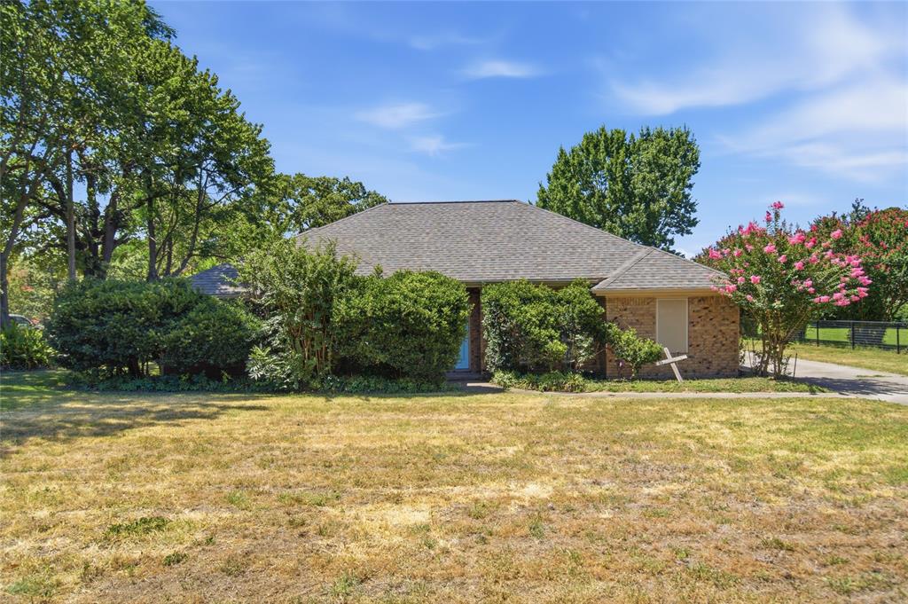 Rare 1+ acre opportunity in the heart of Colleyville's highly desirable northwest corner, home to several multi-million dollar estates and large-lot properties. This ~99' x 499' deep lot offers exceptional potential for builders, investors, or buyers seeking a premier estate property, with plenty of room for future expansion. A large 40' x 60' workshop with electricity offers space for cars, furniture-making, woodworking, or other major hobbies. The existing 2,321 SF single-story home has great bones and a solid floorplan, ready for some cosmetics to bring it to its full potential--plus recent updates including roof, gutters, water heater, windows, well equipment, and HVAC system already in place. Inside you'll find 2 living + 2 dining areas plus a large bonus room next to the primary suite, currently used as a spacious closet for the primary bedroom.  It could easily be re-purposed as a study or nursery. The house has an attached 2 car garage and the shop could accommodate 4 more vehicles.  Functional water well.  Less than one block to the Cotton Belt Trail. Zoned R40, with horses allowed. Contact city to verify horses and number allowed.  GCISD.  Bring your vision and make this home your own.