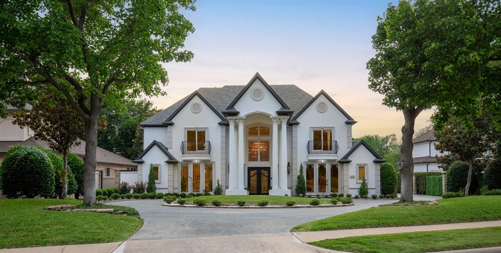 This spectacular luxury residence in coveted West Plano built by Ventura Custom Homes is thoughtfully enhanced with $500,000 in upgrades and designed for elevated living. A grand double iron front door opens to a dramatic entry highlighted by travertine flooring, rich wood tread staircase with custom iron balusters, stunning bronze designer lighting, and extensive crown moldings. The home showcases both front and rear staircases, motorized chandeliers, updated shades throughout the main level, and an executive office with loft space. The impressive two-story living room is filled with natural light, overlooks the resort-style backyard, and offers integrated surround sound for an immersive experience. The remodeled kitchen features porcelain waterfall countertops, Sub-Zero double fridge, Dacor double ovens and 5-burner gas cooktop, built-in microwave, brass crystal lighting, and beautiful casement windows. The private downstairs primary suite offers a spacious sitting area ideal for a gym or additional home office and a luxurious spa-inspired bath completely reimagined with a freestanding soaking tub, marble walls, oversized walk-in shower, dual vanities and makeup vanity, and an expansive closet. All 5 baths have been remodeled and feature smart toilets. Additional living spaces include a downstairs pool lounge with a wine fridge and sink, and an upstairs bonus room. Modern conveniences include Ecobee thermostats, integrated audio with 28 speakers, and numerous mechanical improvements. Step outside to a true backyard oasis situated on a peaceful creek lot with expansive green space and exceptional privacy. Enjoy an infinity-edge pool with an elevated spa, bubblers, poolside bar seating, flagstone hardscape, outdoor shower, Aqualink automation, a gas fireplace, rear balcony, and iron security fencing with gated yard access. Lakeside on Preston is nestled in one of Plano’s most desirable locations. Close to Preston Rd situated near DNT and between Hwy 121 and PGBT.