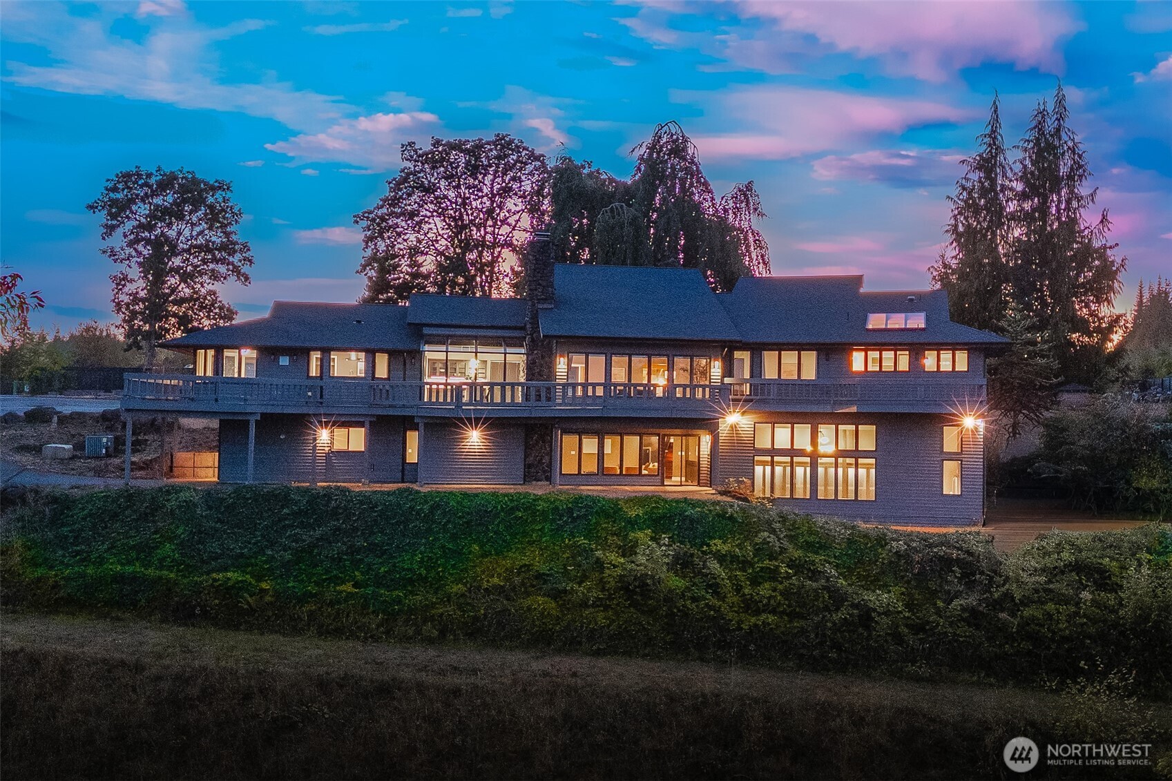 Extraordinary views of Mt. Rainier and the Chehalis Valley. Custom-built estate on 4.23+/- acres, 5500 sf (+/-) 3 bedrooms & 4.5 bath offers everything you’ve been looking for. Vaulted cedar ceilings & impressive stone wood-burning fireplace serve as a stunning focal point in the expansive living area. The granite countertops, butler’s pantry & wet bar make this home an entertainer's paradise.  Large windows throughout the living and formal dining area allow enjoyment of the ever-changing seasons. With multi-generational living in mind, this home offers a second kitchen & incredible entertainment space, perfect for hosting friends. Three-car garage, newer roof & room for toys, this property offers it all.