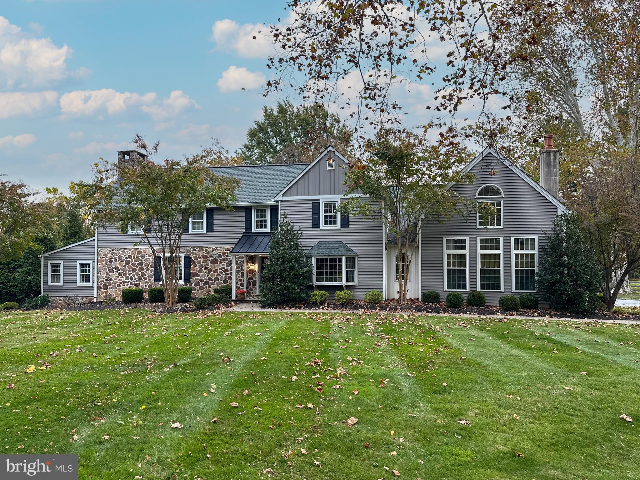 Welcome to 1141 Lafayette Rd, a fully REDESIGNED and RENOVATED Colonial nestled on 2 PRIVATE ACRES in the coveted Colonial Village neighborhood of Wayne. This timeless residence seamlessly blends historic charm with modern luxury, featuring original restored pumpkin pine floors, a custom gourmet CHEF'S KITCHEN with premium cabinetry, stone countertops, and high-end appliances, plus DESIGNER UPDATED BATHS and a spacious layout with abundant storage, a FINISHED BASEMENT (including a playhouse with slide!), and an oversized 2-car garage. The walk-up unfinished attic offers expansion potential, while the OUTDOOR OASIS includes a custom designed pergola, a fully equipped kitchen with leathered granite countertops and high-end appliances, in-ground HEATED SALTWATER POOL w/ SPA and tanning ledge, all surrounded by mature trees for ultimate privacy. Since 2016, the owners have invested OVER $550k IN UPGRADES, including: new patios, roof, siding, new plumbing, electrical, and HVAC systems, which ensure peace of mind. Let’s not forget that there are TWO PRIMARY BEDROOM SUITES! And here’s the best part - TAXES ARE JUST $13K on almost 2 ACRES  in the heart of Wayne! This unbeatable & SOUGHT-AFTER MAIN LINE LOCATION located on a quiet, tree-lined street is just minutes from the King of Prussia Town Center, dining, boutiques, top-rated schools, and major highways. A rare opportunity in Colonial Village, combining classic elegance, modern comfort, and convenience.