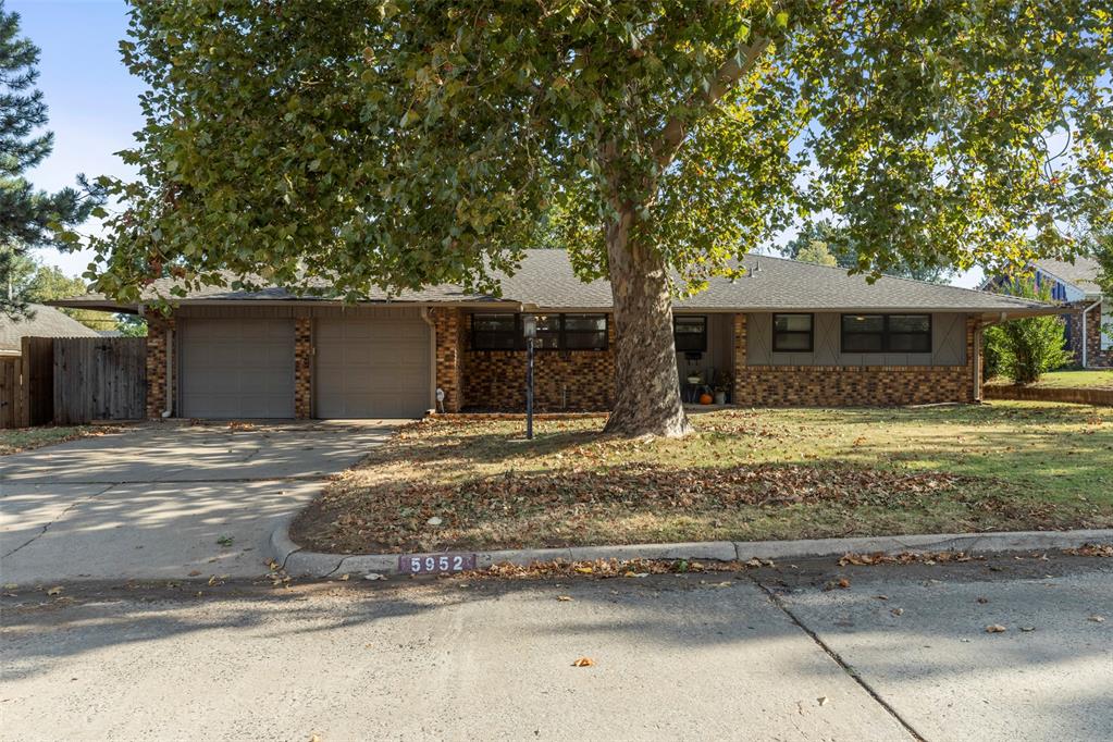 OPEN HOUSE SUNDAY OCTOBER 19 2:00 - 4:00    Welcome to this charming 3-bedroom home with an office, ideally located in a quiet, established neighborhood just minutes from I-44, Northwest Expressway, and downtown. Enjoy the convenience of being within walking distance to Coronado Heights Elementary School, a local award-winning school known for its excellence.

The office space can be used as a second living room, a formal dining room or an office.  There are two sets of glass front doors to create a sense of openness but still have the opportunity for privacy.  

Inside, you’ll find a warm and inviting living space accented by beautiful wood beams, crown molding, and built-in shelves that add character and charm. The cozy corner fireplace serves as the perfect focal point, while the private dining room offers a comfortable setting for family meals or entertaining guests. The eat-in kitchen has newer cabinets, an island and stainless steel appliances. 

This home includes three spacious bedrooms, a full hall bath, and a primary bath featuring a walk-in shower. The attached two-car garage offers additional convenience and storage.

Outdoors, you’ll love the huge backyard shaded by mature trees—ideal for relaxing, playing, or hosting gatherings. Additional highlights include a welcoming front porch, a back patio, new fencing on the north side, replaced pickets throughout the rest of the fence, and gutters already installed. The backyard sheds will be freshly painted as soon as weather permits.

This well-maintained home combines timeless charm, modern comfort, and a peaceful setting close to everything—don’t miss your opportunity to make it yours!