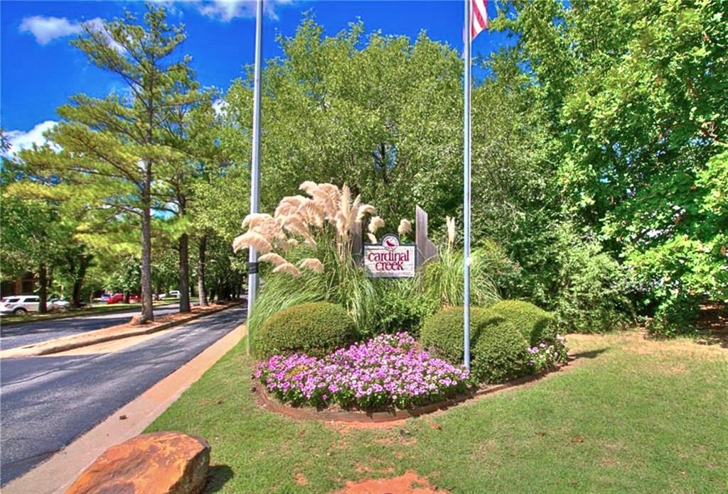 Immaculate and beautifully updated 2-bedroom condo! – Located in a safe, gated community, just MINUTES from the University of Oklahoma! Cardinal Creek offers a multitude of great amenities, such as pool, tanning deck, clubhouse, EV charging stations, and private gated security. This convenient downstairs unit has been meticulously cared for and tastefully upgraded, featuring neutral paint colors, updated flooring, windows, doors, light fixtures and more. You will love the updated kitchen with granite countertops, deep farm sink, tile flooring, pantry and tons of cabinet space. Two full-sized bedrooms, each with large walk-in closets and private upgraded vanity space. The jack & jill bath arrangement offers convenience that is just perfect roommate accommodation. Stackable Washer/Dryer and additional storage! Heat & Air upgraded and regularly serviced. All roofs have been replaced in the complex approx. 2023. The units are all electric and extremely affordable. HOA covers water, sewer, trash, exterior maintenance and access to all amenities. A beautiful complex, featuring mature trees, friendly common areas and a peaceful environment. Close to the OU Golf Course, Biking distance to OU campus, with quick highway access to hospital, shopping, great restaurants and more!