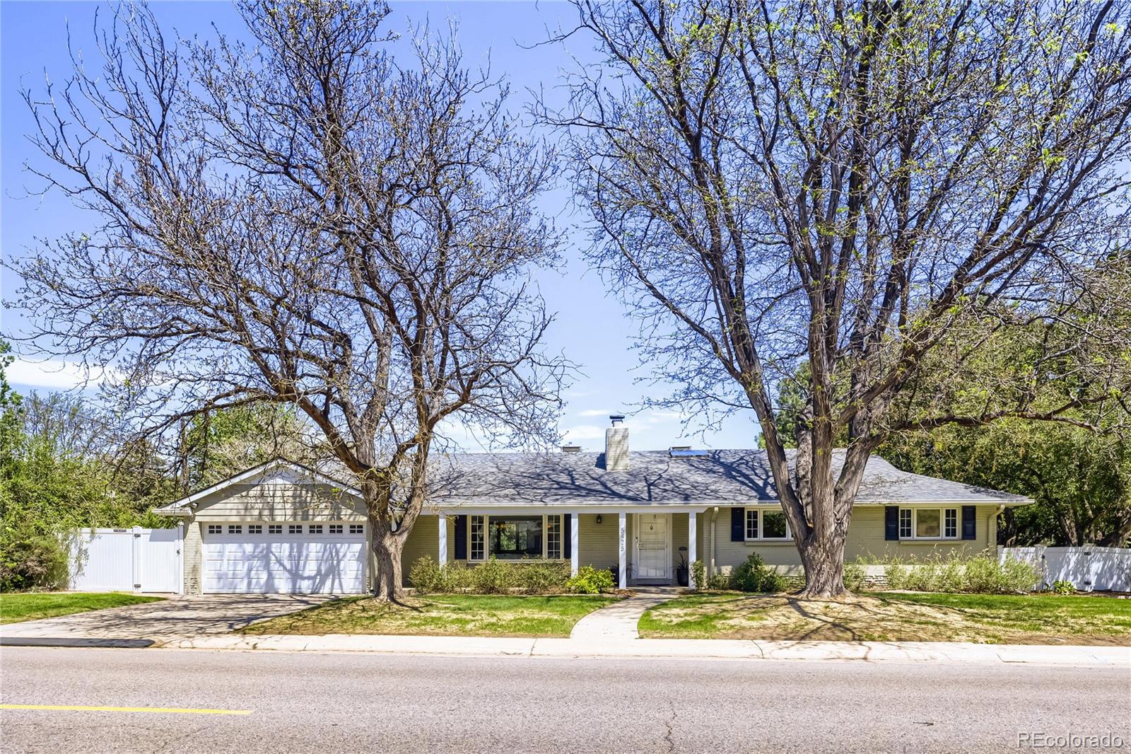Stunning Mid-Century Modern home in the heart of Hilltop. This home is completely updated and remodeled. Enjoy a spacious covered front porch that invites you into an open floor plan featuring hard-wood floors, a living room with tons of natural light and wood burning fireplace that is open to the dining room and beautifully updated kitchen. The main floor family room has a gas fireplace and opens to an outdoor patio with retractable awning. A second patio off of the kitchen is perfect for outdoor living, grilling and enjoying our beautiful Colorado evenings. Plantation Shutters throughout the main floor. The main floor primary suite is remodeled with a 5-piece bathroom with Italian marble, radiant floors, steam shower, heated soaking tub with TV, walk-in closet with California Closet system and laundry. 2 other bedrooms on the main floor share a full bathroom. In the basement there is a wine room hidden behind a bookshelf as well as a 4th bedroom with en-suite bathroom and 2nd laundry. The basement family room is a haven for entertaining and has storage galore. A wall of built in cabinets, shelving and a handy sink. Everything is done in this home and welcomes you in to enjoy it as your own. The backyard is private and fenced with a storage shed. This location can't be beat. So close to everything. A short walk to Robinson Park and close to Cranmer and Crestmoor Park. Great local shopping and dining within minutes.  Nothing to do buy move in and enjoy.