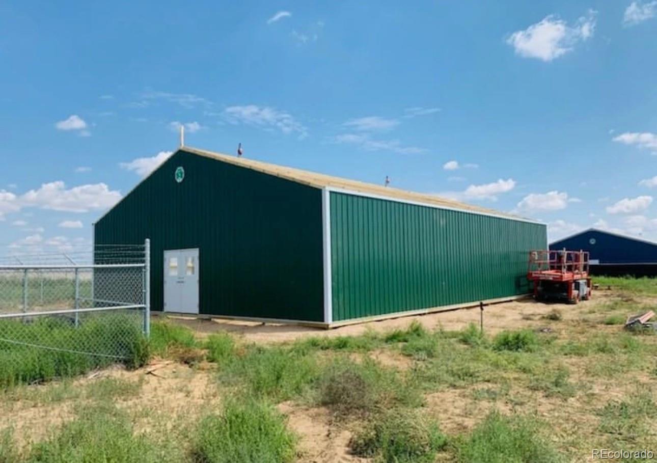 5 acre lot with a 60' x 40' newer pole barn. There is water on the property through public source. Electrical transformer is at the lot line but is not connected. There is no septic or sewer line, but Seller believes you can connect to public source.