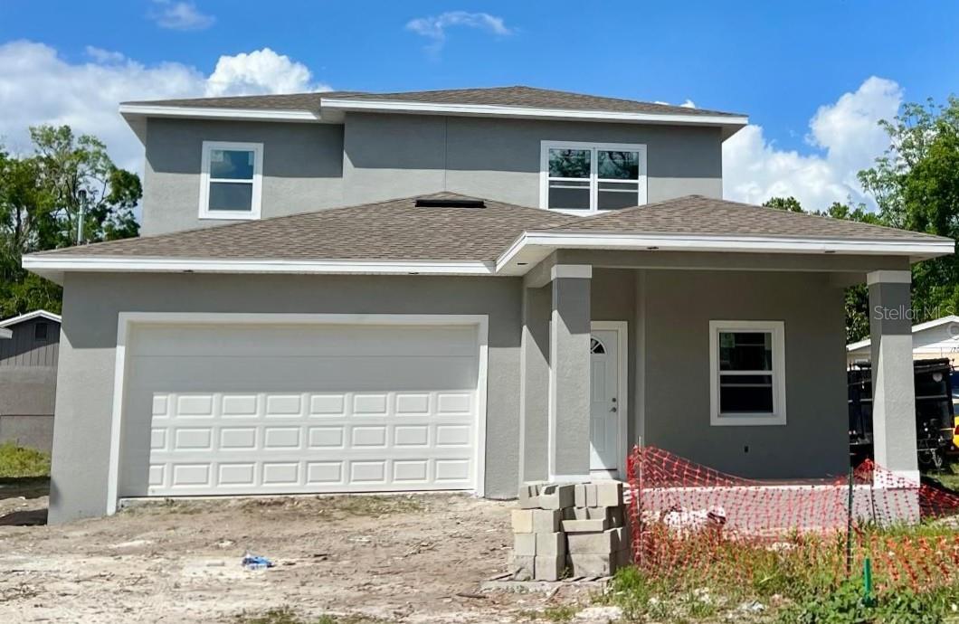 Under Construction. Brand-New Home in Tampa Overlook | Estimated Completion Late MayExperience the perfect blend of modern design, luxury finishes, and everyday functionality in this beautifully crafted two-story home, tucked away in a quiet Tampa Overlook neighborhood.This thoughtfully designed 3-bedroom, 3 full-bath residence features bright, open living spaces ideal for both entertaining and comfortable living. At the heart of the home, the chef-inspired kitchen showcases 42-inch soft-close cabinetry, granite countertops, upscale finishes, and pantry flowing effortlessly into the main living and dining areas.The first floor is adorned with stunning porcelain tile flooring, while the second level offers durable and stylish laminate flooring. A versatile first-floor bonus room with a full bath provides flexibility for a guest suite, home office, or flex space tailored to your needs.Upstairs, an additional family room/loft offers even more room to unwind. The primary suite serves as a private retreat, featuring a spa-inspired bathroom with a stand-alone soaking tub and separate shower.Designed with both comfort and efficiency in mind, the home includes separate air conditioning systems for the first and second floors, along with impact-resistant windows for enhanced storm protection.Additional highlights include a 2-car garage equipped with an electric vehicle charging station, offering modern convenience for today’s lifestyle.Ideally located between I-275 and I-75, this home provides easy access to everything Tampa provides —just 15 minutes to downtown and 20 minutes to Tampa International Airport. Enjoy close proximity to Busch Gardens, the University of South Florida, MOSI, University Mall, Tampa General Hospital, and numerous parks and recreational areas.Don’t miss this rare opportunity to own a beautifully upgraded, brand-new home in a prime location—schedule your private tour today!