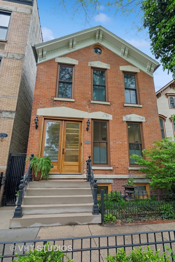 Nestled in the heart of the Old Town Triangle on a rare 25' x 144' oversized lot, this stunning 1880s brick residence blends rich history with modern luxury. With only three owners over the past century, the home underwent a full gut renovation in 2002, down to the studs, and now includes a substantial three-story rear addition measuring 40' x 20'. This thoughtful expansion significantly increased the home's footprint, making space for four spacious bedrooms and three full bathrooms on the second level.  The expansive lot also accommodates a serene, beautifully landscaped backyard and a two-car garage with access via charming Fern Court.  A major design upgrade was completed in late 2019, led by renowned architect and designer Sharlene Young of Symbiotic Living Architecture + Design (Chicago & London). Highlights of this meticulous renovation include:  Kitchen: Custom Pinea cabinetry, high-end appliances (Sub-Zero, Miele, Bosch, and beverage fridge), an oversized white marble island, Tom Dixon lighting, a custom banquette, and a coffee/bar station.  Primary Bathroom: Full renovation with custom cabinetry, a luxurious Victoria + Albert soaking tub, Hansgrohe fixtures, and floor-to-ceiling custom tile work.  Additional Bathrooms: A complete renovation of the first-floor bath and the addition of an en-suite full bath to the front bedroom.  Ideally situated in one of Chicago's most cherished neighborhoods, this home offers close proximity to the lakefront trail and beaches, the vibrant dining and entertainment along Wells Street, and iconic local spots like Twin Anchors and Marge's Still. Convenient access to CTA trains and buses and within the highly sought-after Lincoln Elementary School District.