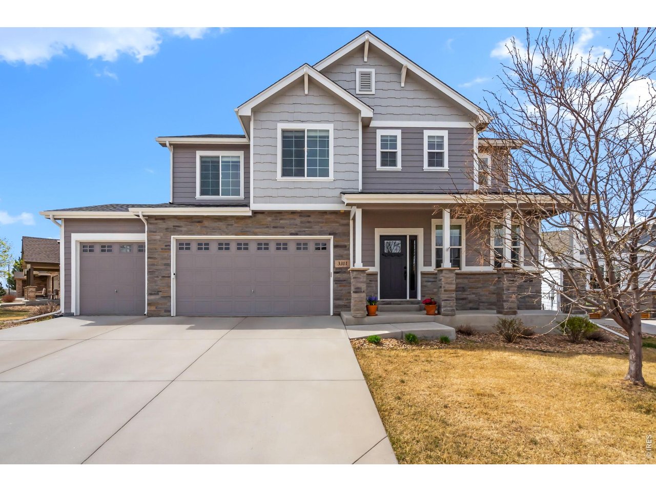Mountain views from your own walkout balcony, welcome to this beautifully maintained two-story in Loveland! Thoughtfully designed open floor plan features expansive cathedral ceilings in the living room with lots of natural light, 9' ceilings throughout, a main floor bedroom and 3/4 bath, and a mud room with bench. The kitchen shines with a pantry, island, and bar, perfect for entertaining. Upstairs you'll find 3 bedrooms, a loft, a 5-piece primary suite with walkout balcony showcasing those amazing mountain views, and a convenient upstairs laundry room. The oversized 4-car garage makes this home as practical as it is impressive. Major updates include a newer roof with Class 4 hail-resistant shingles (2025), updated exterior paint (2025), and fresh carpet on the main and upper levels. The fully finished basement (2016) adds an additional bedroom, full bath, and rec room, ideal for guests or flex space. Backyard patio expanded (2021), and an active radon system is in place. Enjoy sunsets with your loved ones! This one checks every box!
