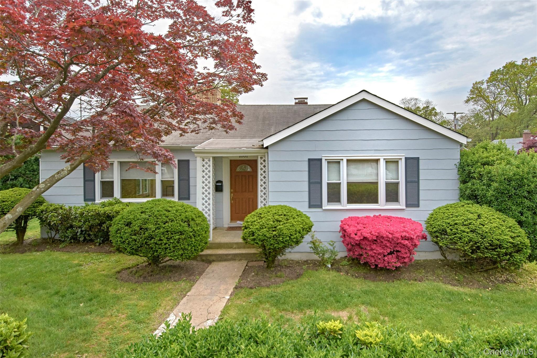 This spacious and sun-filled Ranch features a private, level yard in an unbeatable, convenient location. There is an updated kitchen showcasing stainless steel appliances and granite countertops with a door leading to the yard. The living room has a fireplace and the dining room has sliders to the outdoor patio, offering the perfect space for entertaining and everyday enjoyment. Additional features include two large bedrooms, an updated bath, and a full basement with laundry, plenty of storage, and access to the garage. Located just up the street from Florence Park and a short distance to Rye Neck schools, Metro North, and the Village with shopping and restaurants. This perfect home offers both comfort and convenience for either just starting out or downsizing. Don’t miss this wonderful opportunity! The house is situated on a larger than average lot.