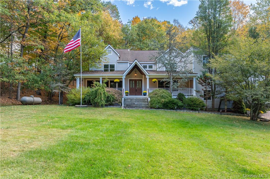 Stunning 4-bedroom, 2.5-bath contemporary home in North Salem, NY, set on 1.41 acres with a heated in-ground Gunite pool. At its heart is a newly constructed gourmet kitchen featuring custom cabinetry, Quartz countertops, center island with seating, and premium appliances including a Sub-Zero refrigerator and Viking 6-burner dual stove. The kitchen also includes new windows and sliding door leading to the deck.

The open-concept family room with fireplace flows from the kitchen to a sunny deck, creating seamless indoor-outdoor living. Formal living and dining rooms provide elegant entertaining spaces, while the main level also offers a private office, laundry, and mudroom.

Recent updates include all new main floor windows, two new patio doors, and brand new oak hardwood floors on both the main and upper levels. The home features a newly installed 3-zone HVAC air conditioning units, plus a new well pump and water tank for added peace of mind.

Upstairs, the expansive primary suite features vaulted ceilings, cedar-lined closets, and a spa-like bath with jacuzzi tub and glass-enclosed shower. Three additional nicely sized bedrooms and a full bath with double vanities complete the level.

Car enthusiasts will love the 4-car garage with hydraulic lifts. A large unfinished walk-out basement adds endless potential.

As part of the Lake Hawthorne Homeowners Association, residents enjoy year-round community events—from 4th of July BBQs and beach bonfires with s’mores to ice skating on the lake and neighborhood block parties.

Conveniently located near I-684, dining, and shopping.