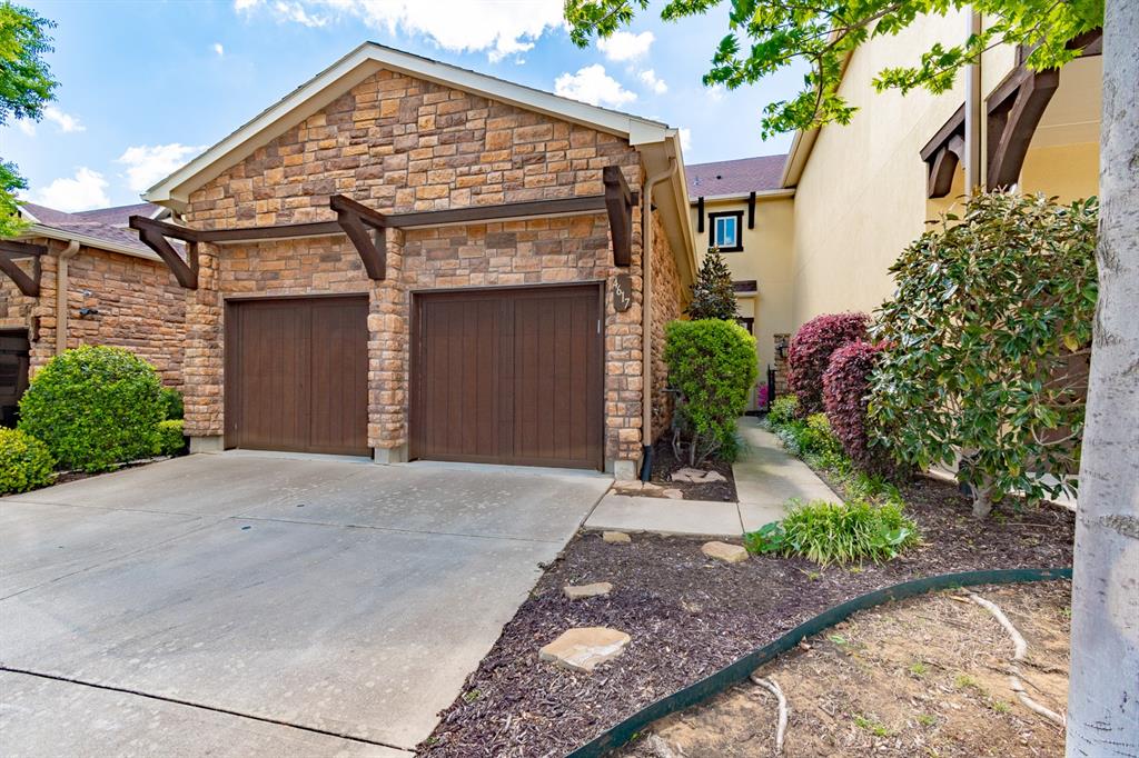 Don't miss this custom townhome nestled among the oak trees and creek in Stone Bridge Oaks! With its prime location, you'll be just minutes away from DFW Airport and can enjoy shopping and amenities in every direction. This custom home features hand-scraped wood floors, crown molding, solid wood doors, separate dining and office spaces, and an abundance of windows to let natural light shine throughout.