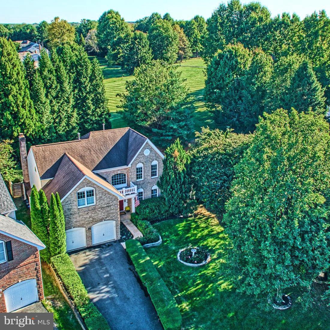 Exceptional retreat on a stunning private lot in a quiet cul-de-sac. This beautifully updated home features an open floor plan with refinished hardwood floors and an upgraded white quartz kitchen with premium appliances. The two-story family room impresses with a custom stone gas fireplace, vaulted ceilings, and a skylight that fills the space with natural light. A main-level home office with architectural glass doors and built-in cabinetry provides the perfect work-from-home setting. Additional highlights include spacious living and dining room with extra windows,  a renovated laundry area and an epoxy-finished garage.Upstairs, you’ll find four bright bedrooms, each with organized closets. The primary suite is a true retreat with soaring vaulted ceilings, two walk-in closets, and a just-renovated spa-inspired bathroom showcasing custom tilework, dual vanities, a soaking tub, and a luxury glass shower.The lower level is an entertainer’s delight with a wet bar, large recreation area, exercise room, and bonus room—perfect for guests or hobbies. Outdoor living shines with a new Trex deck, screened porch, and patio overlooking a deep, private backyard with a spacious side yard and inviting fire pit.This home combines modern style, thoughtful updates, and ultimate privacy in one of Reston’s most desirable locations.  It is in the Great Falls Crossing neighborhood where you will enjoy the walking trails, community pool, tennis/pickleball courts, basketball court, 2 new tot lots. The location is premium situated with in 15 minutes to both Tysons Corner and Dulles Airport, 2.3 miles to Metro and within minutes and walking distance to Lake Fairfax Park and Lake Anne Farmers Market.  Extra feature include a whole house gas generator which conveys.