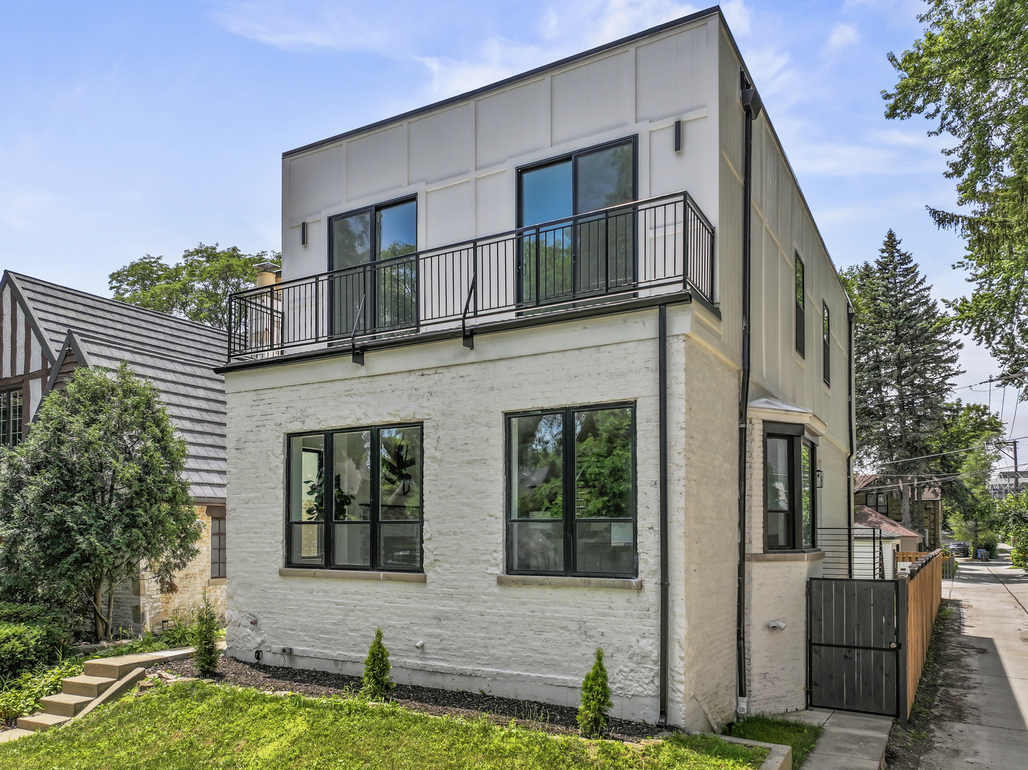 This exceptional,rarely available, better than new 5 bedroom and 3.1 bathrooms custom build masterpiece in Sauganash is more than a residence that effortlessly blends refined luxury with contemporary sophistication. With every single detail meticulously curated this beautiful home captivates you from the moment you arrive. Impressive first level with 10ft ceilings, open floor plan with chef's kitchen is true show stopper featuring custom white and navy blue kitchen cabinets, ambient led lights, large island with quartz countertops, gold modern fixtures and top of the line Thermador stainless steel appliances. Combined dining and living room with an elegant wood burning fireplace ready for you gatherings. Four bedrooms on the upper level featuring 9 ft ceilings, large master bedroom with walk in closet and a masterpiece master bathroom, another elegant full bathroom, washer and dryer and front balcony . Basement features a fifth bedroom, a full and gorgeous bathroom, a very large family room and a large den. Everything is new! Nice backyard and a 2 car garage. Minutes from the school, parks , shops and I-94. You won't want to miss this special home !!!