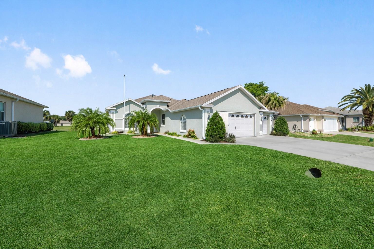 Enjoy resort-style living in this beautiful 3 bedroom, 2 full bath split floor plan home with a two-car and golf cart garage.  Looking for a home designed with elegance? Well this one is it! The open layout provides comfortable living and effortless flow. Not only is the living space something to boast about but this kitchen is equipped with all brand NEW appliances, self closing cabinets and drawers, even a Culligan water filtration system!!  The master bedroom has a spacious walk-in closet as well as shower assist bars in each of the bathrooms.  The home offers a peaceful setting right off the 13th hole and provides stunning golf course views right from your backyard. This home really has it all! Ocala Palms is a 55+ Community that includes many amenities: social activities, walking paths, and access to a semi private 18-hole, par-72 course. Not only that but the Palms has two beautiful pools (indoor/outdoor), tennis courts and brand new pickle ball courts! Ocala Palms also offers exquisite dining just a golf cart ride away at its very own restaurant Bella Cosa. This home would be a wonderful choice for anyone seeking a comfortable and scenic place to call home. Conveniently located near Publix, shopping centers, and restaurants, the property is just minutes away from I-75. The World Equestrian Center (WEC) is a short 5-minute drive, with Gainesville 45 minutes away and Orlando reachable in 1 hour and 15 minutes.
