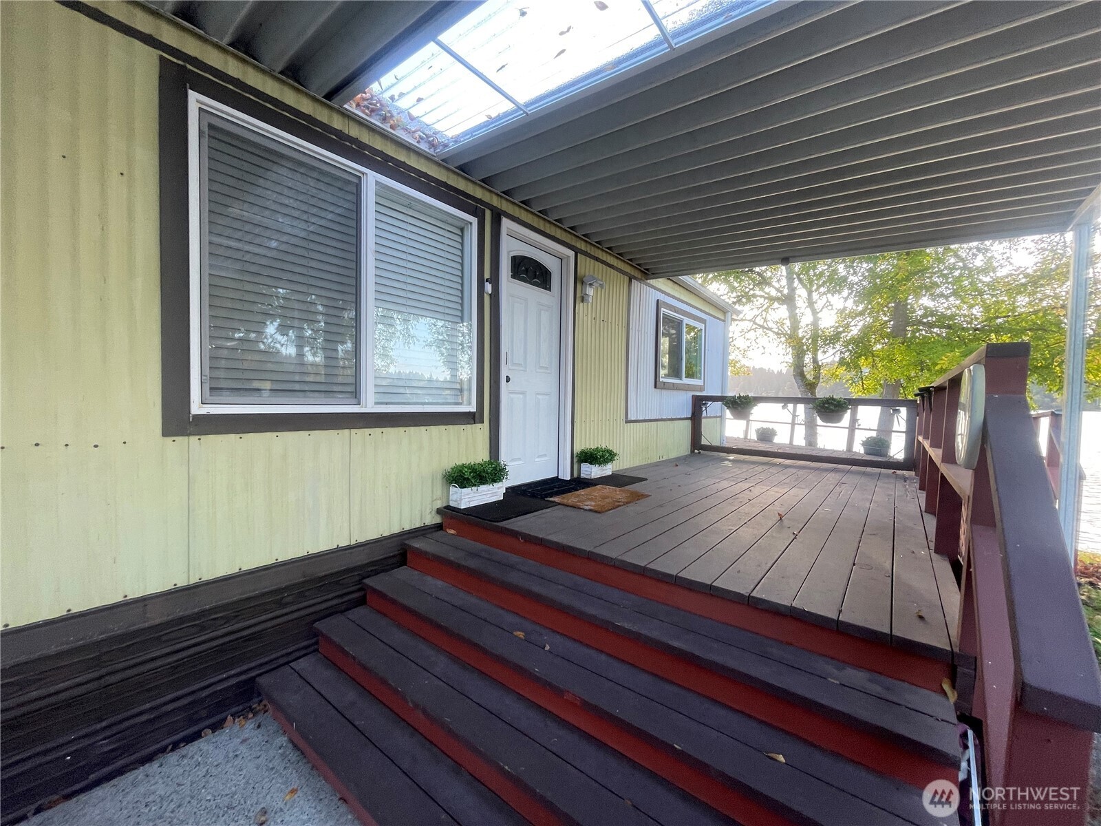 Enjoy lakeside living on Black Lake in Olympia with this waterfront gem! This home features brand-new hardwood floors, a remodeled bathroom, and a private EV charging station. With stunning lake views from your windows and community amenities like boat storage and direct lake access, this is the perfect spot for a peaceful, adventure-ready lifestyle.