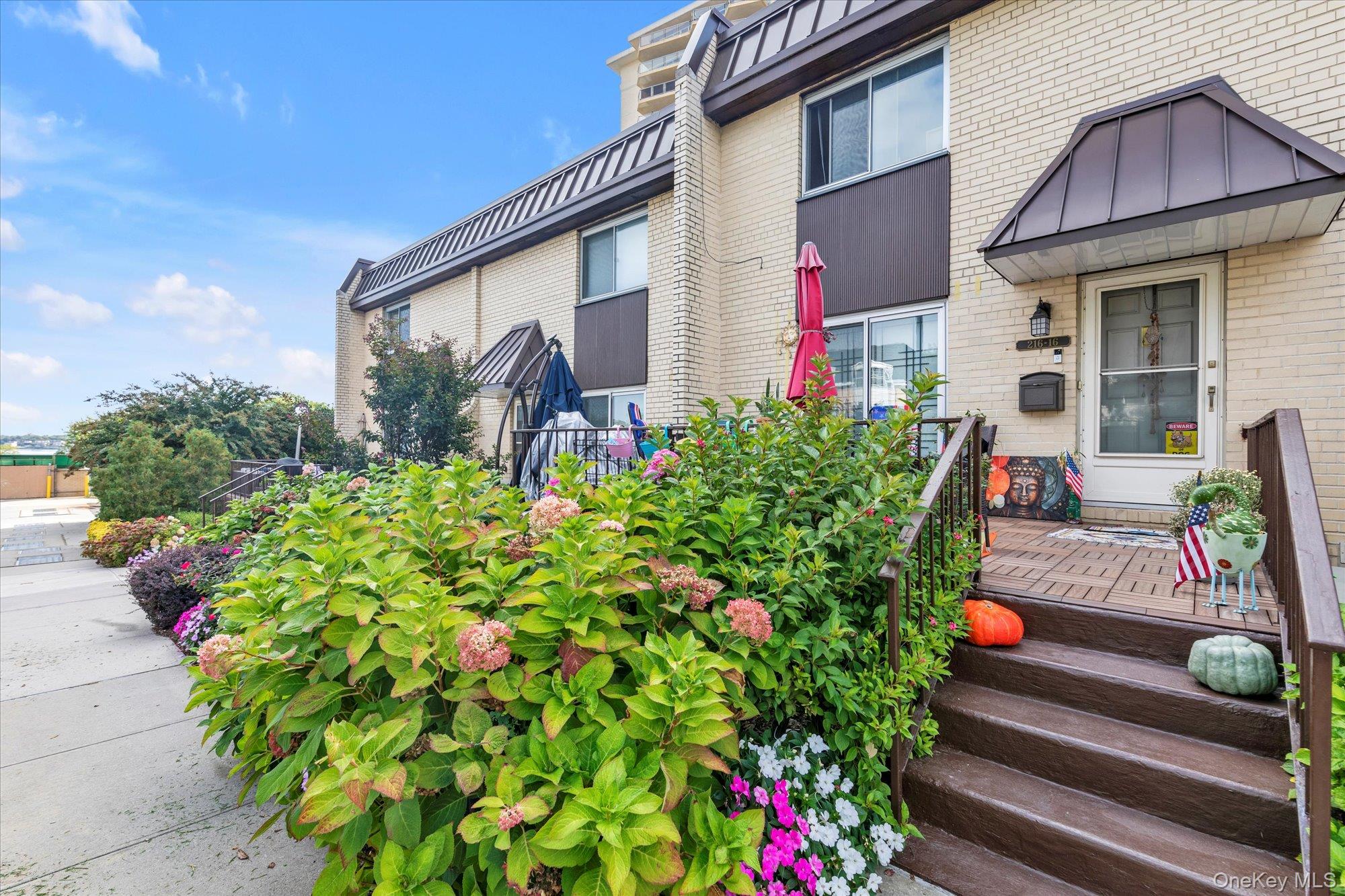 3-Level Townhouse at Water’s Edge – Space, Lifestyle, Resort-Style Amenities & School district # 26. Welcome to 216-16 17th Avenue in Water’s Edge—where you come to upgrade not just your home, but your entire lifestyle. Located in desirable Bay Terrace, this rare 3-level, 3-bedroom co-op offers the kind of space and functionality that’s nearly impossible to find in Manhattan or Brooklyn at this price point. Inside, you’ll find expansive living across three floors -  the first floor has a beautiful gourmet kitchen with lots of counter space and storage, stainless steel appliances and a sleek breakfast bar. The dining room is accentuated by sliding doors to the private patio. A convenient powder room makes entertaining easy. The huge living room has high hat lighting and an exit to the Water's Edge grounds, which offer water views and a plethora of amenities as soon as you enter the manicured grounds.  The second floor layout consist of a large primary bedroom suite with private bathroom, and two additional bedrooms facing the quiet back. There is also a hallway bathroom with soaking tub. The finished basement adds enormous flexibility, perfect for an office, playroom, home gym, media space, or guest bedroom. It also holds the private laundry area with a washer and dryer. What truly sets this home apart is the lifestyle: Here, you’re not just in a neighborhood—you’re in a community designed for living well: *Easy access to Manhattan - LIRR and express bus *Private pool for summer days *Fully equipped gym on the grounds *Tennis & pickleball courts for active living *Playground to grow, play and connect. * Bell Academy and PS 169. An additional  new school is being built in Bay Terrace.*Bay Terrace Shopping center with amazing restaurants, super market, a movie theater and soon a Barnes & Noble! This is the kind of environment where weekends feel like a getaway, and daily life feels calmer and more balanced. This isn’t just a home—it’s a lifestyle upgrade with built-in value.