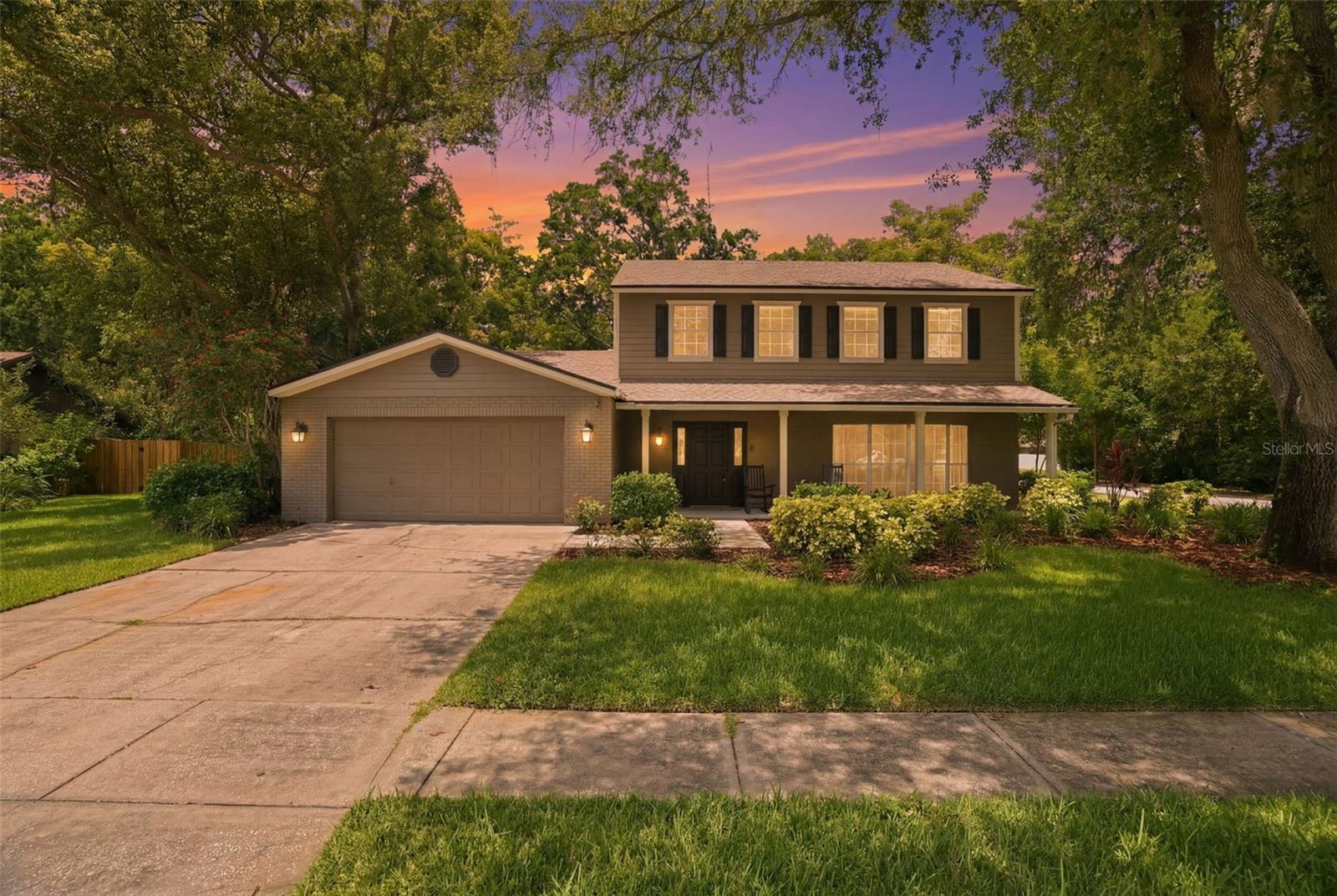 One or more photo(s) has been virtually staged. Welcome to one of Tampa’s most desirable subdivision, LAKE HEATHER OAKS!  This Renovated Pool Home has 4 Bedrm and Living Rm/study/in-law/guest suite could be 5th Bedrm with a full attached bath and walk in closet.  A Gourmet Kitchen w/ custom Shaker Cabinetry with pull out drawers, Quartz Counters, newer appliances and Island overlooks Pool & Conservation area.  Open Family Rm w/ brick wood burning fireplace, opens to the kitchen and Screen Porch.  Master Suite has a huge Walk in Close, cathedral ceilings and a master ensuite. All the generous size bedrooms are upstairs. Additionally, there is a convenient guest 1/2 bathroom on the ground floor. Large Corner lot backs to woods, Heated Screened Pool & Spa recently refinished and surrounded by a paver patio. AC NEW in 2022, Roof NEW in 2022. Pool heater New in 2022.  Community amenities include a private park on Lake Heather that has playground, fishing pier and parties with Sants and Easter Bunny for the kiddos.  This North Tampa Carrollwood location is close to shopping, great schools, hospitals, Tampa International Airport, Busch Gardens, Veterans Expressway, Suncoast Parkway & I-275. A special home awaiting a new owner