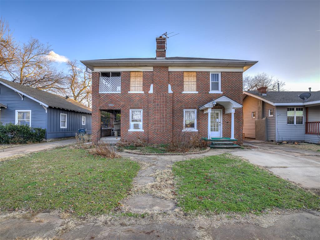 Rare opportunity to restore a beautiful historic two-story brick duplex in Oklahoma City. Property has sustained significant fire damage and will require extensive renovation. Once fully restored, the property offers strong investment potential. Sold strictly as-is with no repairs or warranties. Ideal for investors or builders seeking a high-upside historic project. Property also features a 2 car detached garage. Buyer to verify ARV, square footage, condition, and all information independently.