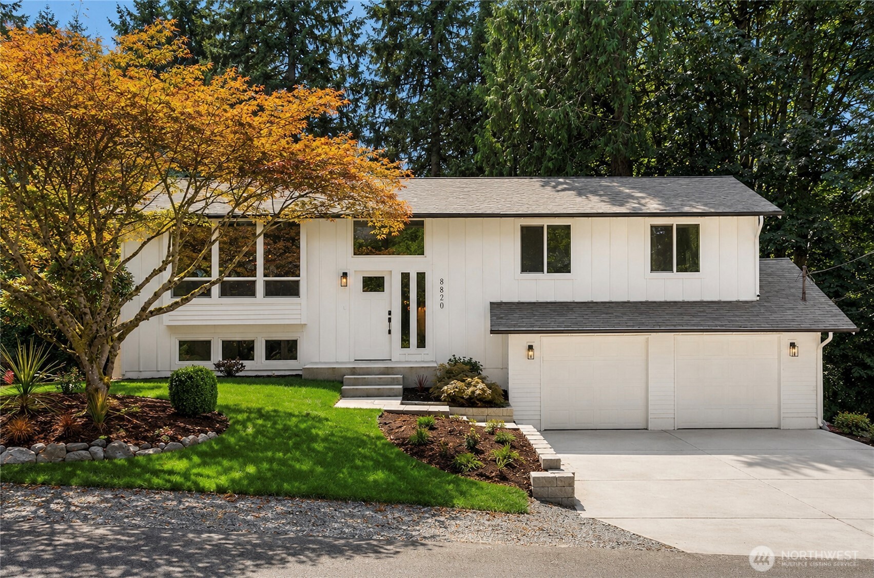 Beautifully reimagined Edmonds home just minutes from downtown and the waterfront. Thoughtfully updated throughout, this light-filled residence blends modern design with timeless comfort. Vaulted ceilings and expansive windows create an airy, open feel, while wide-plank flooring and designer finishes elevate every space. The stunning kitchen features custom cabinetry, sleek surfaces, premium appliances, and an oversized island, seamlessly connecting to the main living area anchored by a striking fireplace. Spacious bedrooms and spa-inspired baths offer a refined retreat, highlighted by clean lines and high-end fixtures. Set on a lush, landscaped lot surrounded by mature trees, the outdoor spaces provide both privacy and tranquility. Ideal location near downtown Edmonds shops, restaurants, parks, and waterfront amenities, with easy access to commuting routes. Turnkey, stylish, and perfectly positioned, this is Edmonds living at its best.