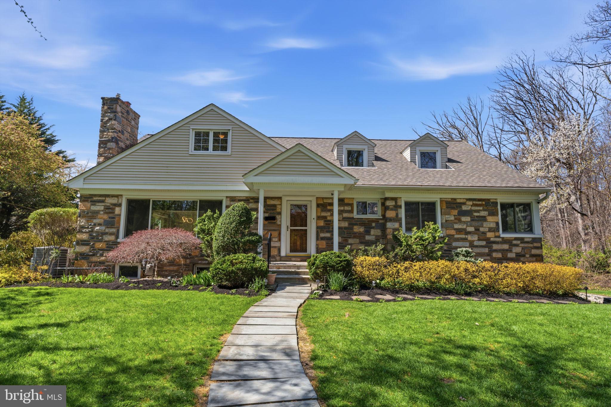 Charming Cape Cod–style home nestled among lush greenery, offering a warm and welcoming setting with generous living space throughout. The first floor features an open, airy layout where the kitchen and dining areas flow seamlessly together—perfect for hosting gatherings or enjoying everyday moments at home. Just off the dining room, a private patio creates an ideal setting for outdoor dining and entertaining during the warmer months, extending the living space outdoors. A conveniently placed powder room off the living room adds comfort for both residents and guests. Plus, a well-maintained GENERAC generator for the home.A private first-floor primary suite with a five-piece en suite bath provides a peaceful retreat, while an adjacent room offers flexibility as a home office, cozy den, or additional bedroom—ideal for today’s lifestyles.The finished basement expands the home’s living space with versatile areas suited for a playroom, media room, home gym, or guest accommodations, complete with a full bathroom and egress.Upstairs, three spacious bedrooms and two full bathrooms provide ample room for family and visitors. A large side yard offers exceptional privacy and is a dream for garden lovers—perfect for relaxing, planting, or enjoying nature year-round.