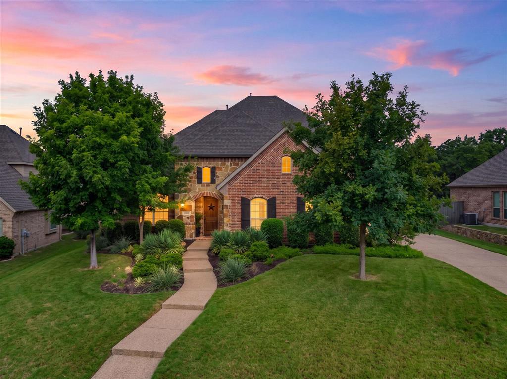 If you've been waiting for a move-in-ready home in the coveted Villages of Lacima at Stonebridge Ranch, where the high-priced items are already done for you, THIS IS IT! Add a private cul-de-sac lot, flexible private quarters and resort-style community amenities, and the search may finally be over. SBR residents enjoy pickleball and tennis courts, a sparkling community pool, miles of scenic walking and biking trails, playgrounds, catch-and-release fishing ponds and future beach club. Wilmeth Elementary (McKinney ISD) is an easy walk, with shopping, dining, entertainment, easy commuting just minutes out, including future multimillion-dollar developments. Big-ticket items are done for you: 30-year shingle roof, 3 new HVAC units (2025), replaced 2 water heaters, insulated garage doors and updated fencing and gutters. Tucked on an interior lot adjacent to the greenbelt, the oversized, level backyard is a classic Texas retreat, framed by mature, professionally maintained trees for shade and ultimate privacy, with a covered patio, fresh sod and room for a DREAM pool addition. Inside, fresh paint, new carpet, new ceiling fans, refinished hardwoods and updated upstairs baths make it truly move-in ready. The downstairs primary ensuite is a private sanctuary overlooking the backyard, with dual sinks, a separate shower, a jetted tub, and a large walk-in closet. A second main-floor ensuite with its own separate entrance offers independent, versatile quarters and works beautifully as a dedicated office or flex space. The large open kitchen anchors the home with an expansive island, separate breakfast room, gas cooktop, double ovens, butler's pantry, huge walk-in pantry, and freshly painted cabinetry, opening to a living area with a cozy gas fireplace. Upstairs offers three bedrooms and two full baths + expansive bonus room ideal for entertaining or recreation and a media room with custom built-ins.  Tons of storage include 3 attics.  See 3D tour!