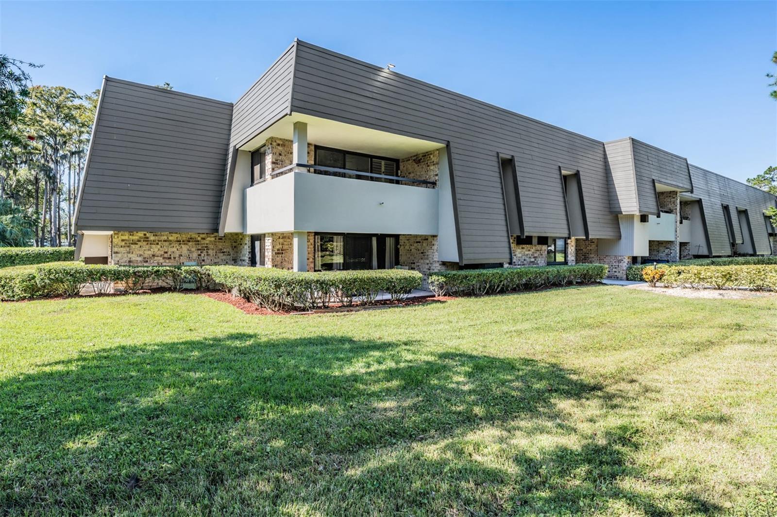 Enjoy Resort Style Living at INNISBROOK Golf and Country Club! This UPDATED 2 Bedroom, 2 Bathroom desirable corner/end unit in the Baltusrol Lodge has been well maintained and is Move-in ready featuring Ceramic Tile throughout & Plantation shutters! The Open Concept Great Room with Dining Room features Sliding Glass Doors that open to the Large Covered Balcony, where you can view Copperhead course. The Updated Kitchen is fully equipped for meal preparation, featuring white cabinets, stainless steel appliances, granite countertops, decorative backsplash, pantry and extended breakfast bar seating. The Master Suite features an Updated Ensuite Bath with Dual Vanities, & Step-in shower featuring decorative tile and seamless glass. Second Bedroom shares an adjacent Updated Bath with New Vanity & Step-in shower. This condo is a perfect place to call Home or for Golf and Tennis Vacations. Monthly HOA fees include water, sewer, Internet, cable, trash removal, parking, 24/7 guard gate security, Laundry, pest control, and more. Innisbrook is a Pet Friendly Community Situated on 900 Wooded Acres of Rolling Hills and the home of the PGA's Valspar Championship. Community Amenities Include (additional fee): 72 Hole Championship Golf (including the renowned Copperhead Course), Tennis Courts and PICKLEBALL, 4 Restaurants including Packard's Steakhouse and the NEW Fairway Coffee and Wine Bar featuring Starbucks Coffee, 6 Swimming Pools, Innisbrook Golf Institute, the Award Winning Salamander Spa, State of the Art Fitness Center, two conference halls and a beautiful Nature Preserve. Fantastic Location Close to County Parks, Beaches, Restaurants, Shopping and 25 min to Tampa International Airport. Laundry Facility with Ice Maker Conveniently down the hall. Buyer has option to join Rental Pool for additional fees.