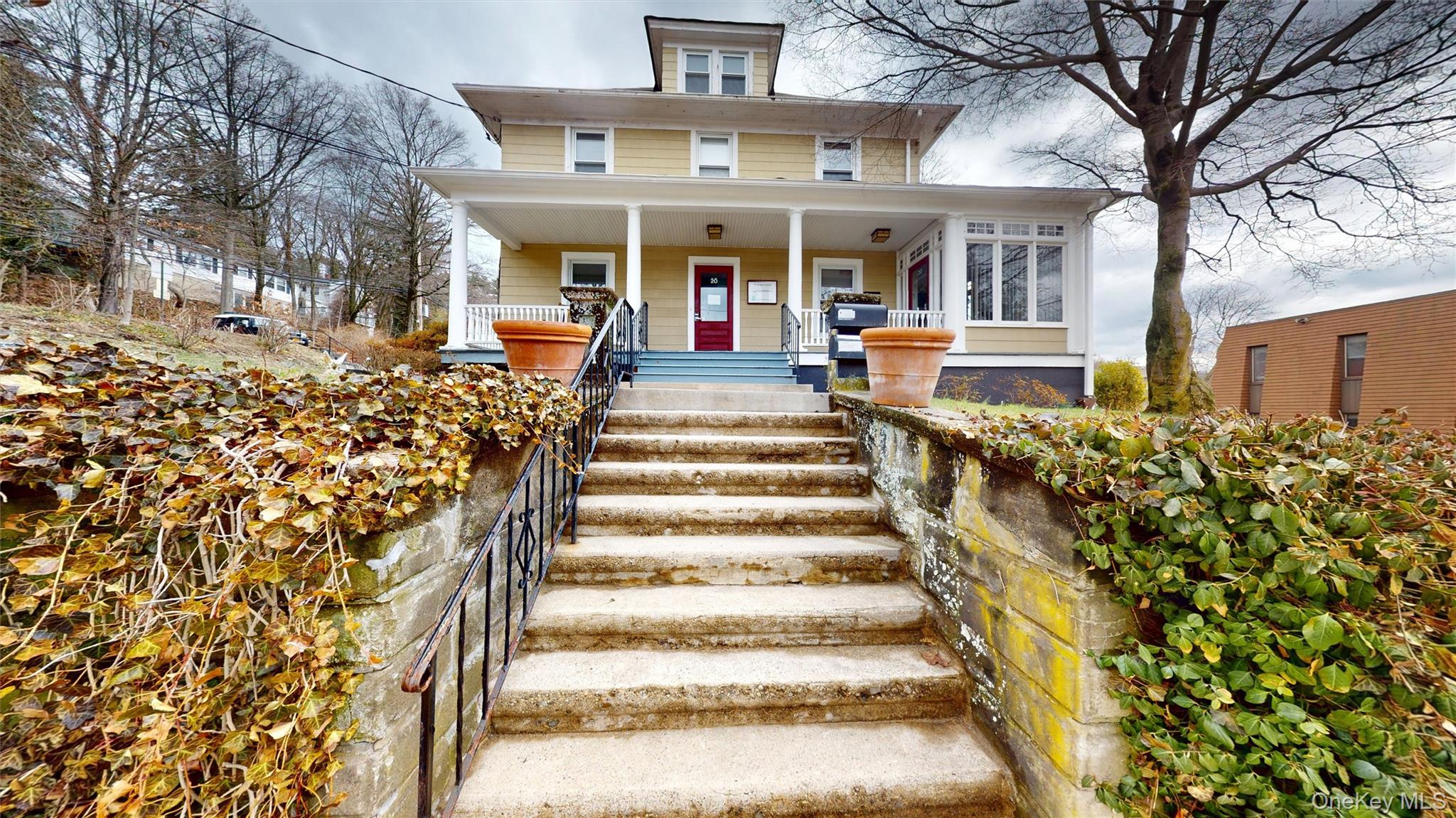 Opportunity awaits at 20 Madison Ave, a legal single-family Colonial offering over 3,300 square feet of interior space on a 0.23-acre lot in Mount Pleasant. Currently configured as office space, legal 4 bed 1 bath, this property presents a unique chance to restore and customize a residential layout to suit your vision. Currently has month to month commercial tenants on 1st & basement and another on 2nd-3rd floors. The existing layout spans multiple levels and includes numerous finished rooms, providing flexibility for reconfiguration into a traditional single-family residence with multiple bedrooms, living areas, and workspace options. A full finished basement with walk-out access adds additional usable space, while the expansive lot offers room for outdoor enjoyment, parking, or future enhancements.The property features central air, public utilities, and a driveway with an 8-car parking lot. Conveniently located near the Taconic State Pway, 2 blocks from Metro North Valhalla stop on the Harlem Line, and local amenities, the location supports a variety of residential living needs.Important: Property is being sold as-is. There is currently no Certificate of Occupancy, and the Town reports three open/expired permits. Buyer is responsible for all due diligence, permits, and any required approvals. A rare opportunity to bring new life to a property with strong fundamentals, generous space, and long-term potential.