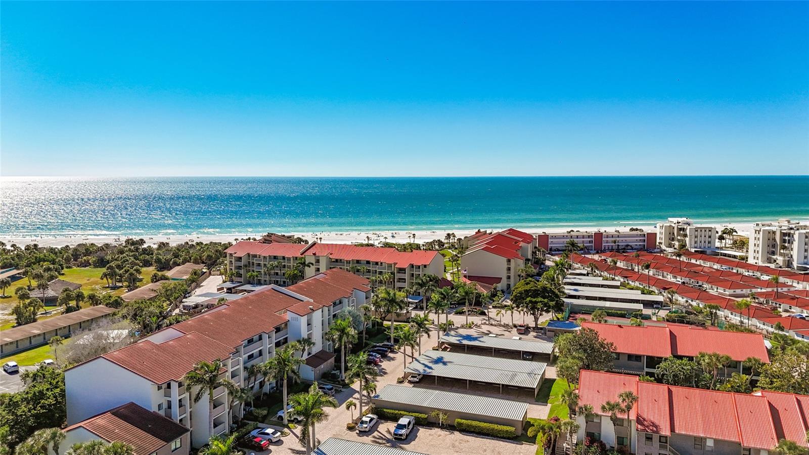 Rarely for sale TURNKEY FURNISHED beach condo at Siesta Dunes, where living the Siesta Key lifestyle comes naturally. Enjoy true convenience with DIRECT BEACH ACCESS to powdery white sand and the sparkling Gulf- no streets to cross, just a short, breezy walk to the beach, pool, hot tub, or tennis court right within the community.With onsite management available and WEEKLY RENTALS allowed, owning and renting is refreshingly simple. Whether you're strolling to dinner, biking to the Village, or simply putting your toes in the sand, every moment here feels effortless. Lovingly maintained by the same owner for 40 years, this residence shines with thoughtful updates, brand-new IMPACT WINDOWS for added peace of mind, and even a gorgeous blue Gulf VIEW from your primary bedroom. Whether you're looking for a smart investment or a sunny place to call home, this Siesta Dunes gem is ready to welcome you!