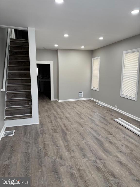 Welcome to this beautiful house for sale, featuring 4 bedrooms and 1.5 bathrooms. The property is completely renovated, offers comfort, fresh paint, new floors, and modern touches. As you step inside a spacious living room, a big eat-in kitchen with new cabinets and quartz countertops. Laundry room with a half bathroom. The second floor has 3 bedrooms and a full bathroom, and the third floor features a large, finished attic that can be used as a 4th bedroom. Big backyard and a fully cleaned, ready-to-be-finished basement. Schedule your appointment today.