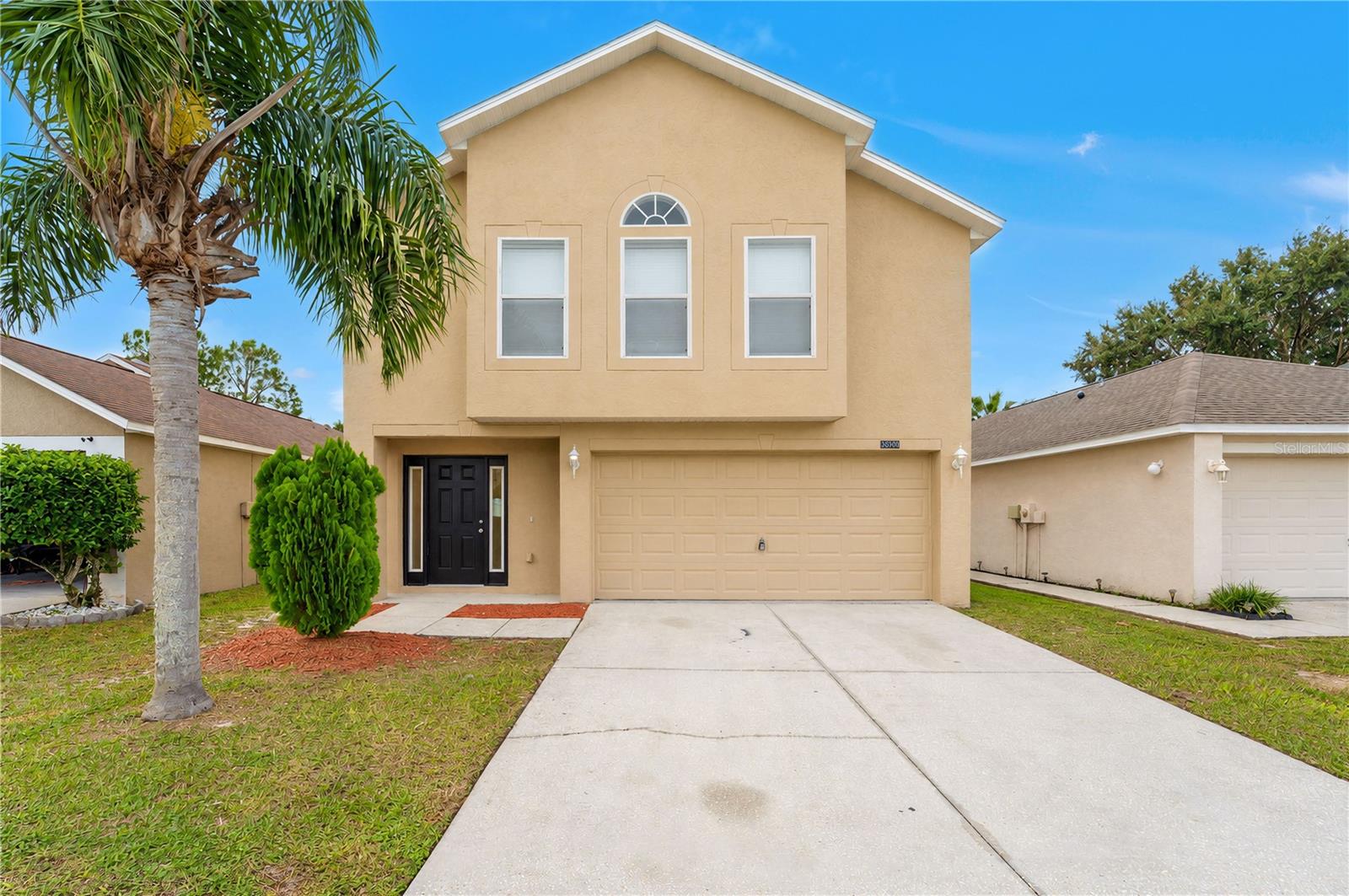 VR tour available. Open the sliding glass doors and you look out at conservation land, not the back of another house. This two-story Wesley Chapel home in Chapel Pines sits on a 0.11-acre lot with no rear neighbors, so the concrete patio and backyard face green space. The big expenses are new or on the way: new HVAC (2026), a new water heater (2026) and a new roof pending permit and installation. The kitchen has new white shaker cabinets with soft-close doors and drawers, White Ornamental granite countertops, a new faucet and disposal, and a new Whirlpool range and dishwasher. Tile runs through the first floor, and vinyl plank continues up the stairs and across the second floor. All four bedrooms are upstairs, including a primary suite with a vaulted ceiling, a walk-in closet and a private bath. Both full baths were updated with new shaker vanities, granite tops, faucets, mirrors, lighting, toilets and tub and shower fixtures. Fresh interior paint, a new front entry door with sidelights, new LED lighting, updated outlets, switches and hardware, and new exterior lights finish the 1,944 SqFt, 4-bedroom, 2.5-bath home, with an attached 2-car garage. Chapel Pines is an established Pasco County neighborhood with a $95 quarterly HOA and no CDD, close to shopping, dining and schools, with I-75 access for the commute to Tampa. Seller offering up to $15,083 toward buyer closing costs, prepaid expenses and/or an interest rate buydown when using Seller's preferred lender. Conditions apply. Come see the view from the back patio for yourself.