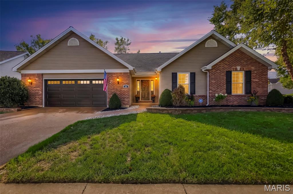 Welcome home to this charming 3-bedroom, 2-bathroom ranch situated on a desirable corner lot in the sought-after Francis Howell School District! Step inside to find a bright, open-concept layout that seamlessly connects the kitchen, dining, and living areas, perfect for everyday living and entertaining. Enjoy peace of mind with newer HVAC, brand-new carpet, and a new, quiet garage door. Outside, you'll fall in love with the beautifully maintained landscaping, complete with fresh mulch and decorative rock. The outdoor living space is a true highlight, featuring two patios and a covered deck, offering plenty of room to relax, entertain, or enjoy your morning coffee. Conveniently located near shopping, dining, and everyday amenities, this home offers the perfect combination of comfort, functionality, and location. Don't miss your opportunity to make it yours!