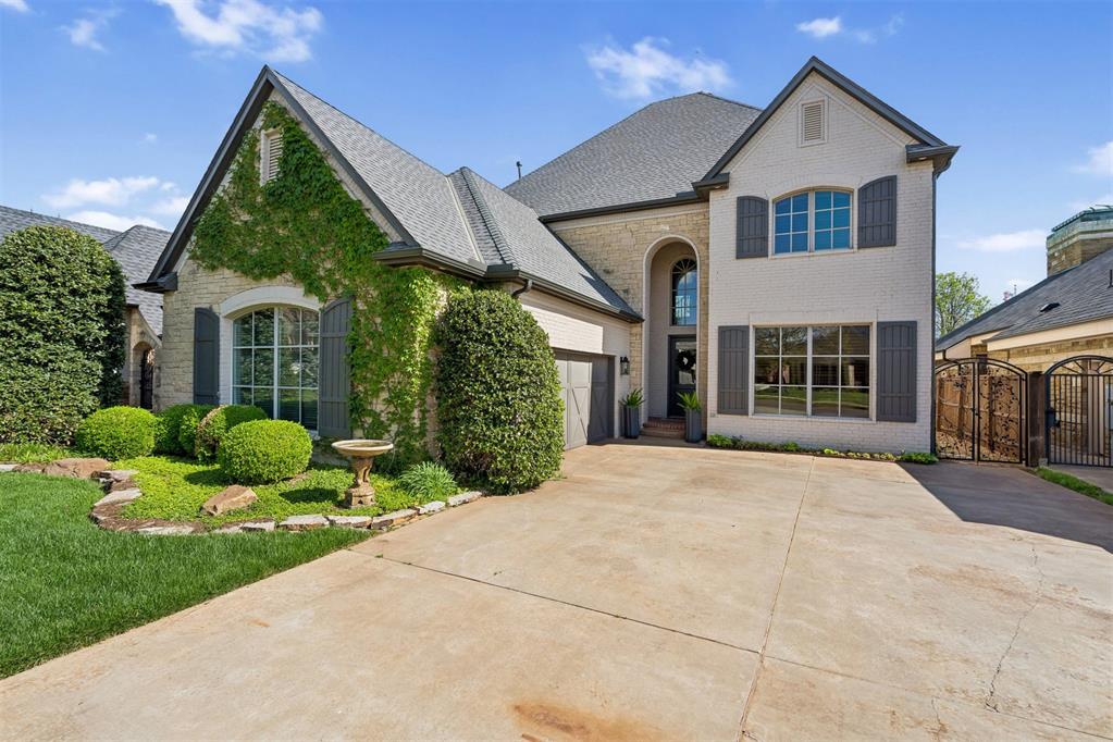 Custom built home backing to the 11th green of the newly remodeled Rose Creek Golf Course. Located on a quiet cul-de-sac in the highly sought-after Rose Creek neighborhood with 24/7 security. Large picture windows capture golf course views while hardwood floors and solid surface flooring run throughout the main level. Plantation shutters provide abundant natural light. Oversized secondary bedrooms offer generous space.Upstairs features a spacious bonus room with mini kitchen, microwave, mini refrigerator, and sink, plus balcony access with panoramic golf course views. Large theater room with two attic access points, including one with expansion potential.Oversized garage with epoxy floors and 5x7 in-ground storm shelter. Covered back patio with outdoor fireplace overlooking the course.Recent updates include KitchenAid stainless refrigerator, convection microwave/oven combo, dual-fuel range, dishwasher, new kitchen paint, exterior refresh, new carpet, updated lighting, new primary bath countertops, kitchen island countertop, fresh interior paint  and whole-home generator by Generac.Enjoy Country Club Living at its finest with an optional membership to Rose Creek! Recent enhancements include The Retreat, a fully functioning fitness facility with a coffee shop, heated pools with a swim up bar, 18 hole putt putt course, masseuse, aesthetician services and a roof top bar!  The club also offers an award winning restaurant, Neighborhood Provisions, a Speakeasy, Pub and Pickleball Courts! All with access via your personal golf cart!Contact the listing agent today for a private showing!